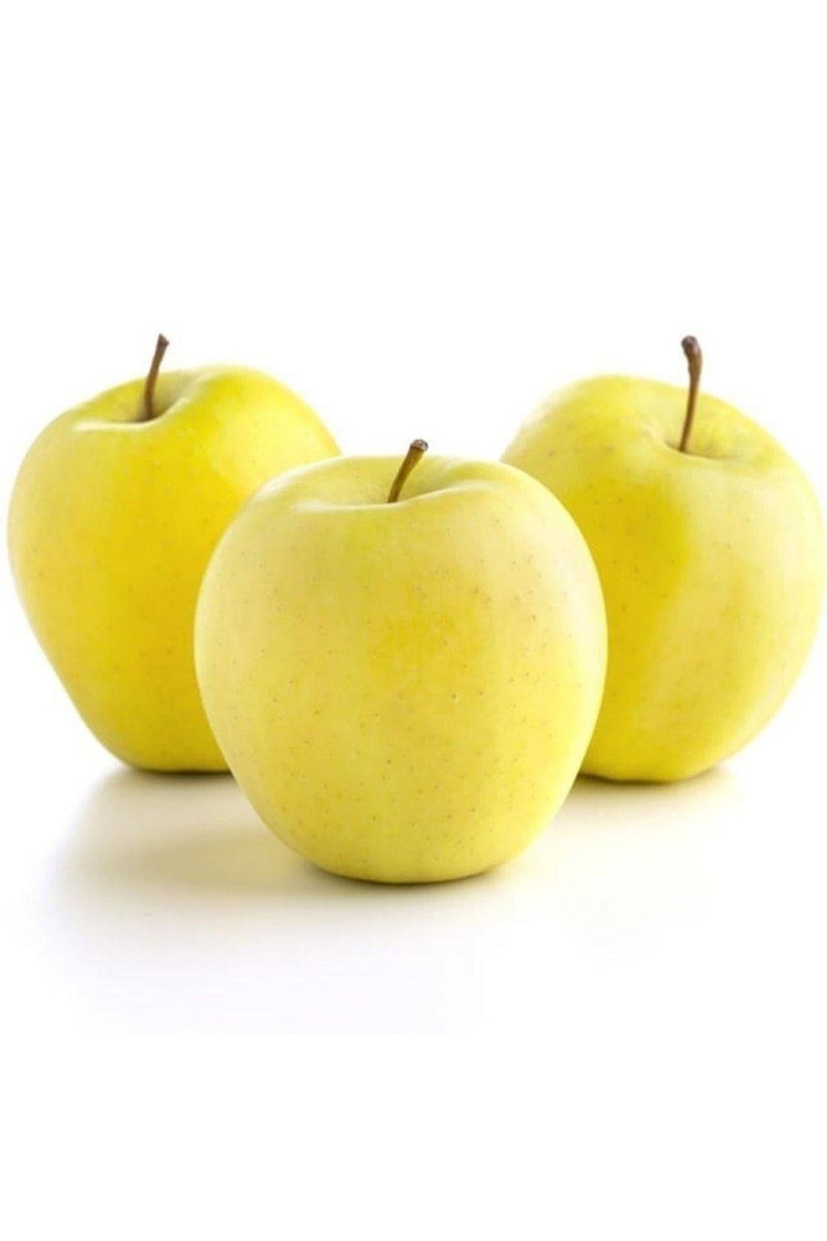 Яблоки Голден Делишес на белом фоне