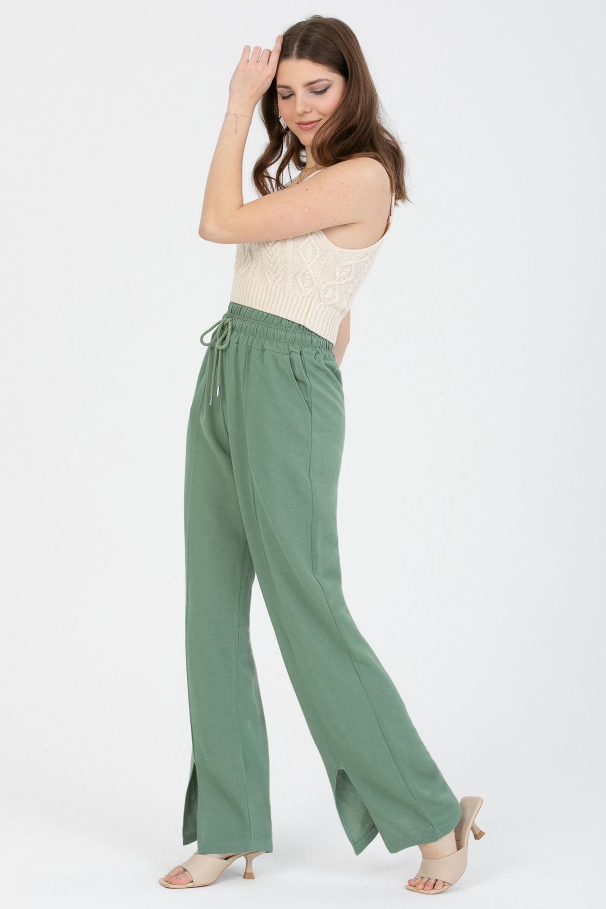 MD trend Women's Mint Green Elastic Waist Tied Linen Trousers with Front  Seam Detail and Leg Slits - Trendyol