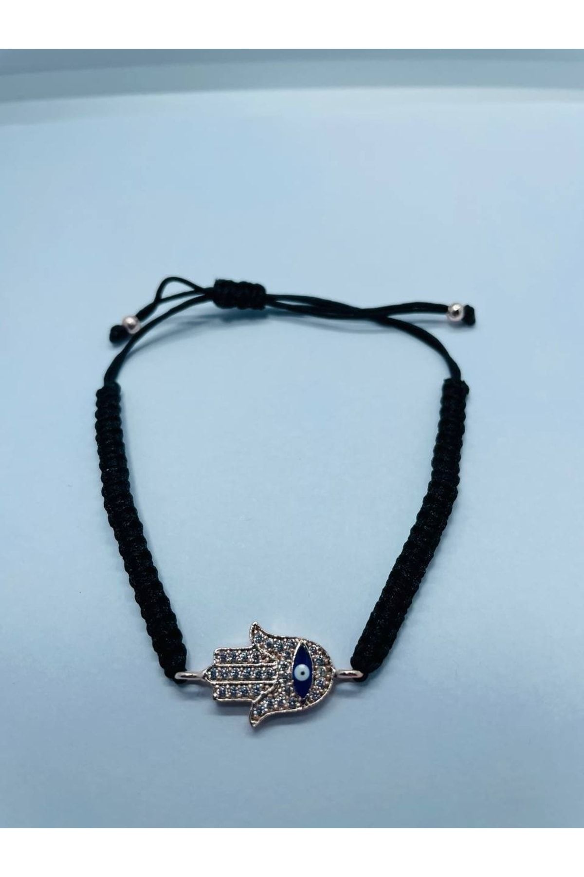 Evil eye hot sale hand bracelet