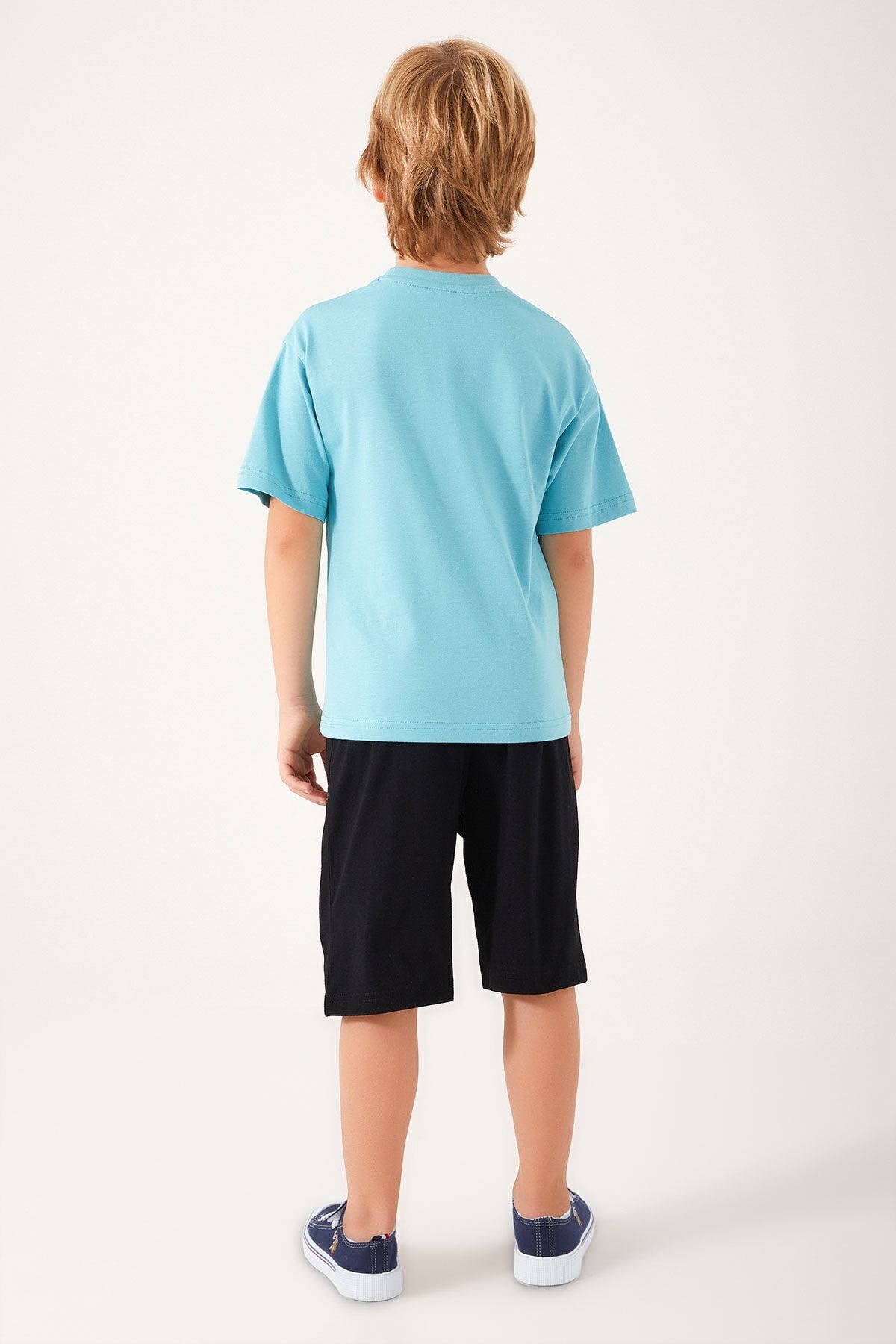 White polo shorts store with blue horses