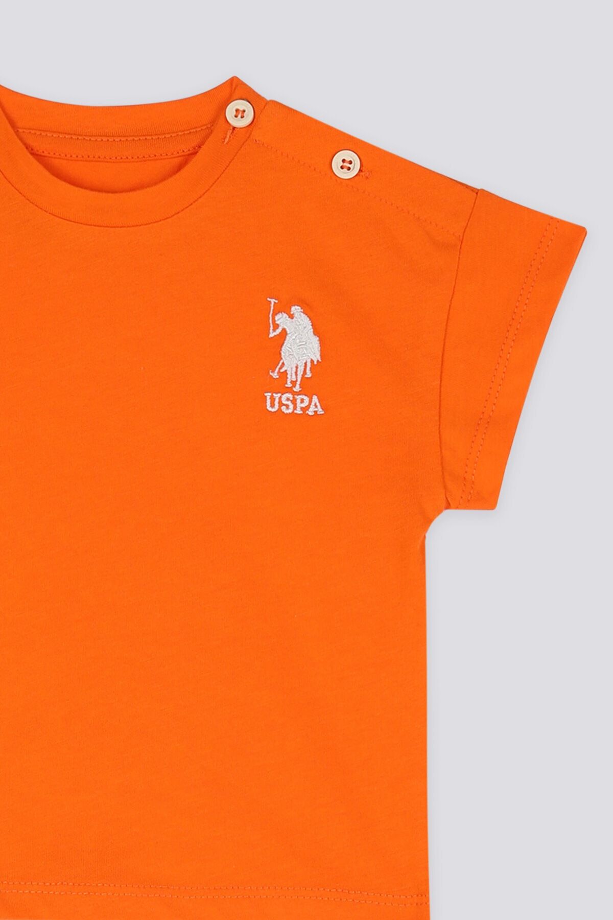 U.S. Polo Assn. پایه. ست شلوار تیشرت پسرانه نارنجی رنگ هارمونی پولو اسن