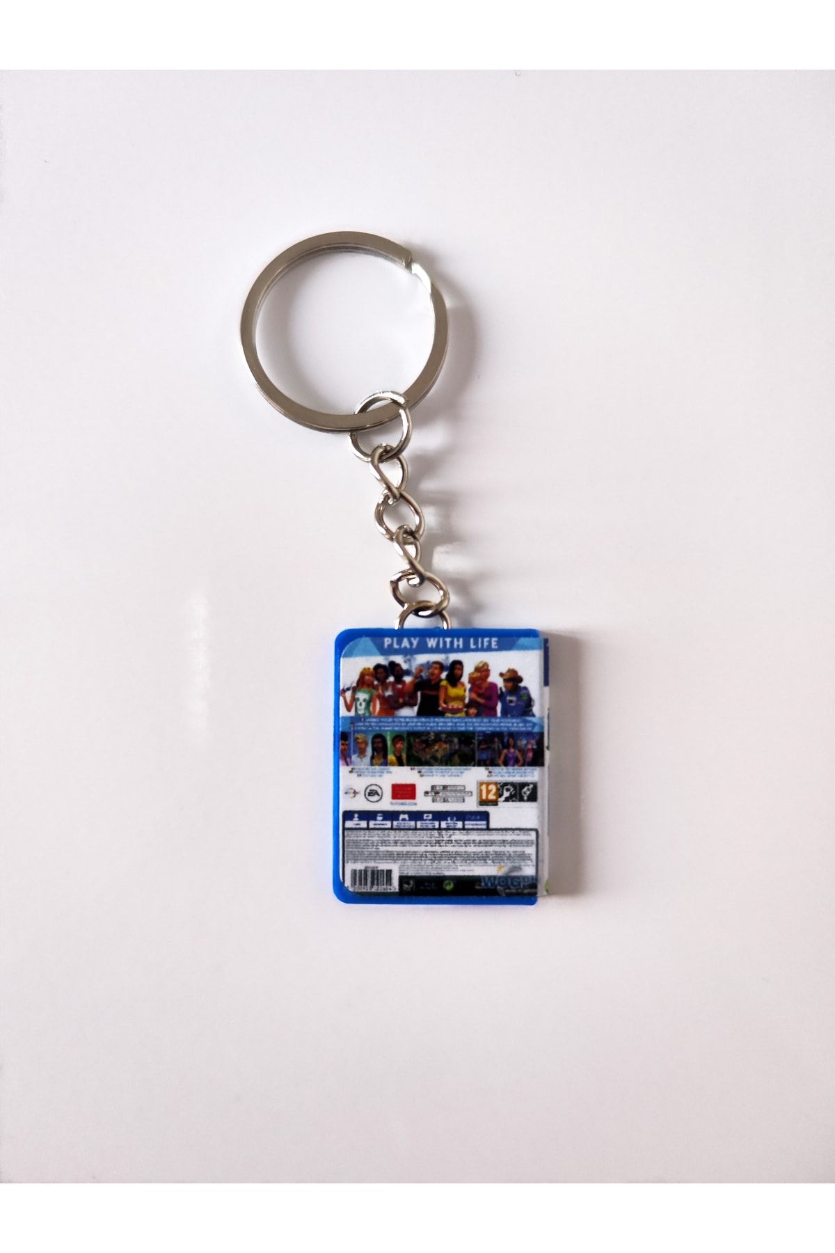 Cosmic Star-Sims 4 Miniature Ps4 Game Box Keychain 2