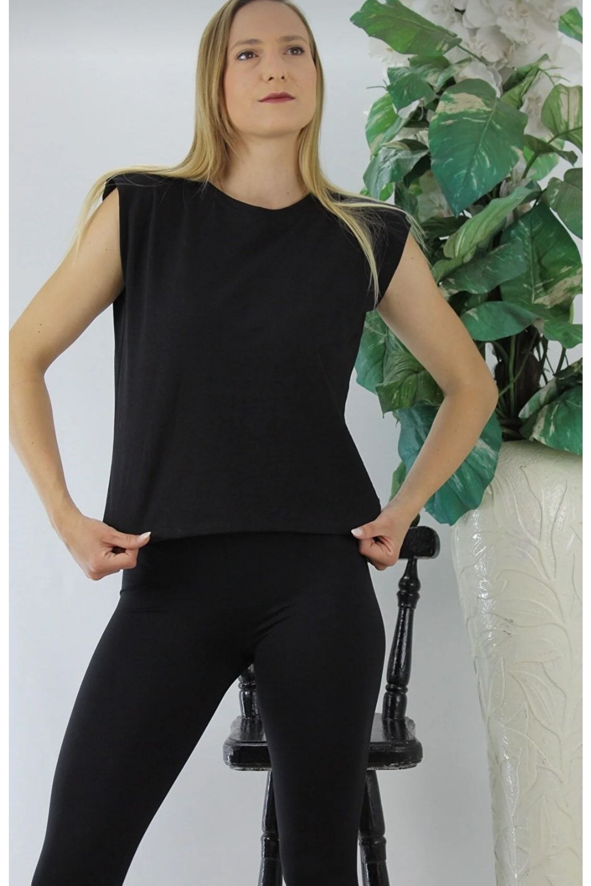 Sleeveless t shirt sales with shoulder pads