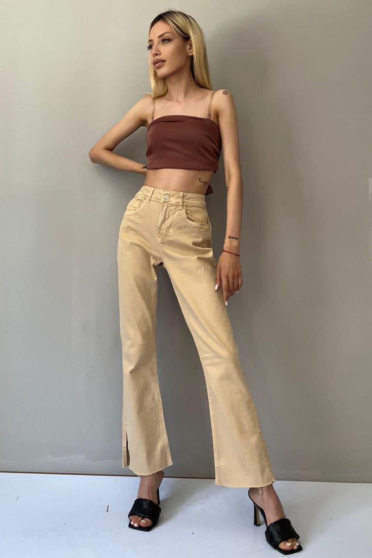 شلوار جین جیب دار مدل گشاد بغل چاکدار کمربلند زنانه مدمکست Madmext (برند ترکیه)