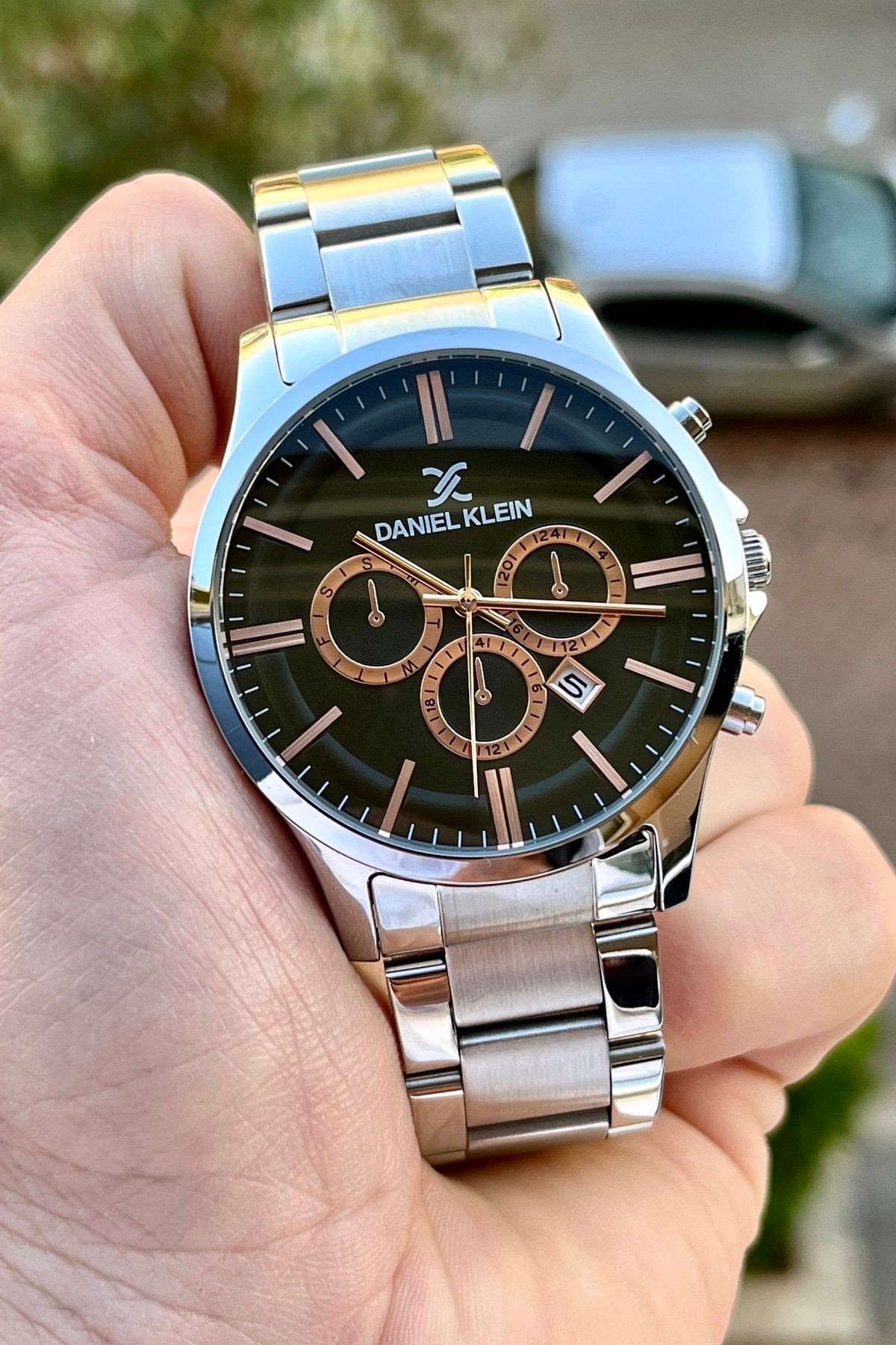 Daniel klein silver toned dial watch top