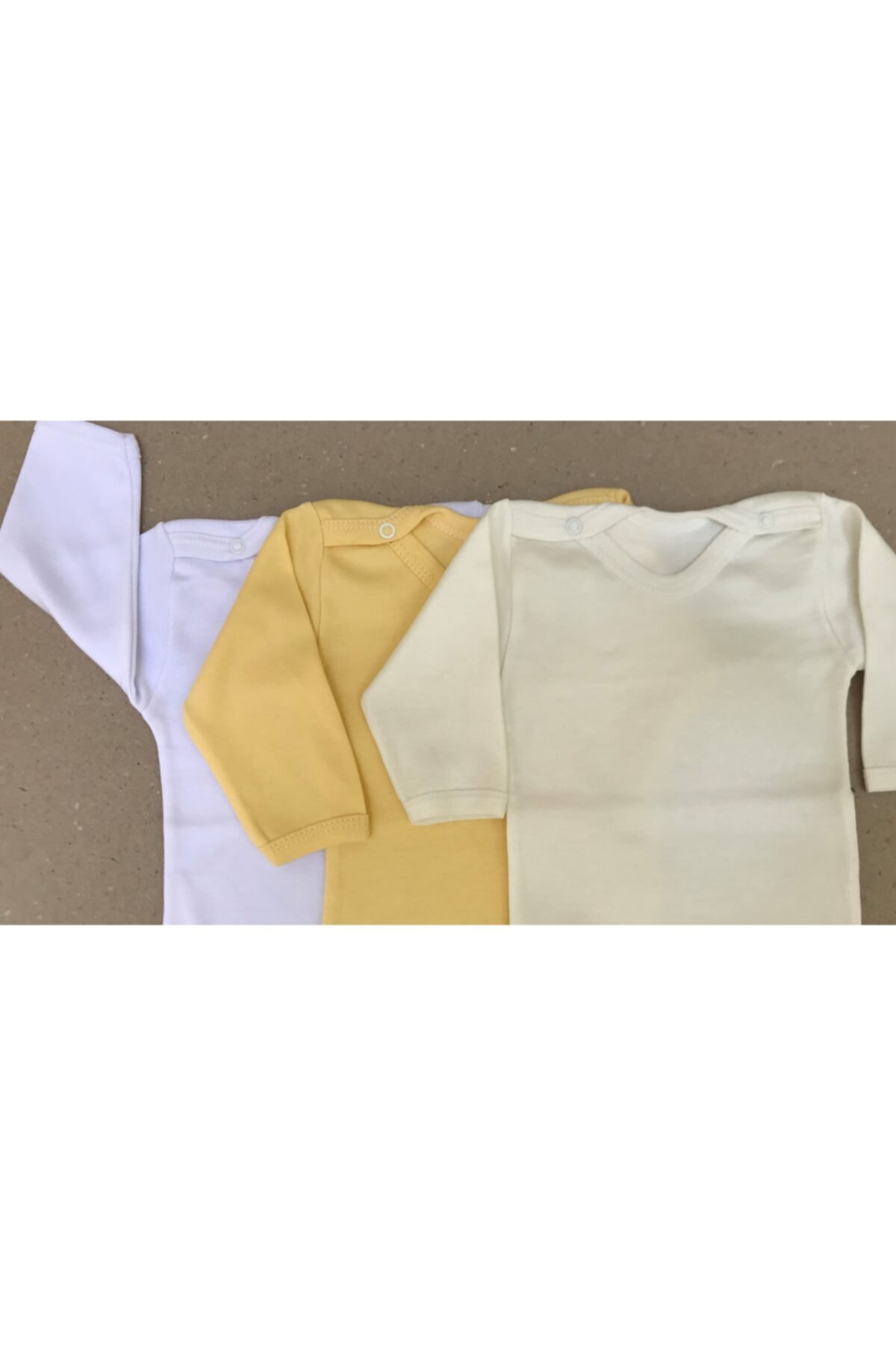 بادی نوزادی پسرانه – دخترانه سفید bebedino | 1400000 اورجینال - تصویر 3