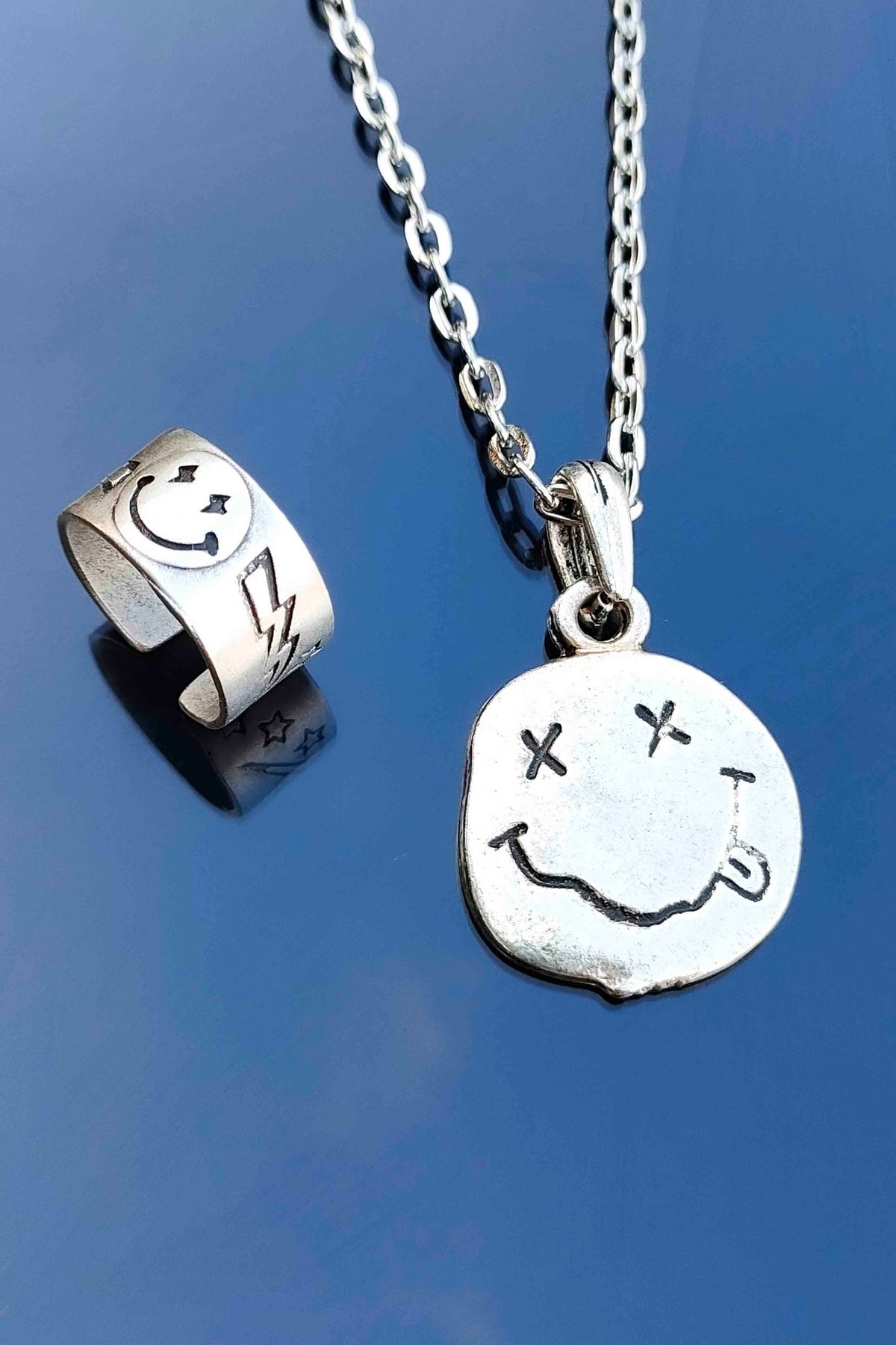 Smiley face shop pendant
