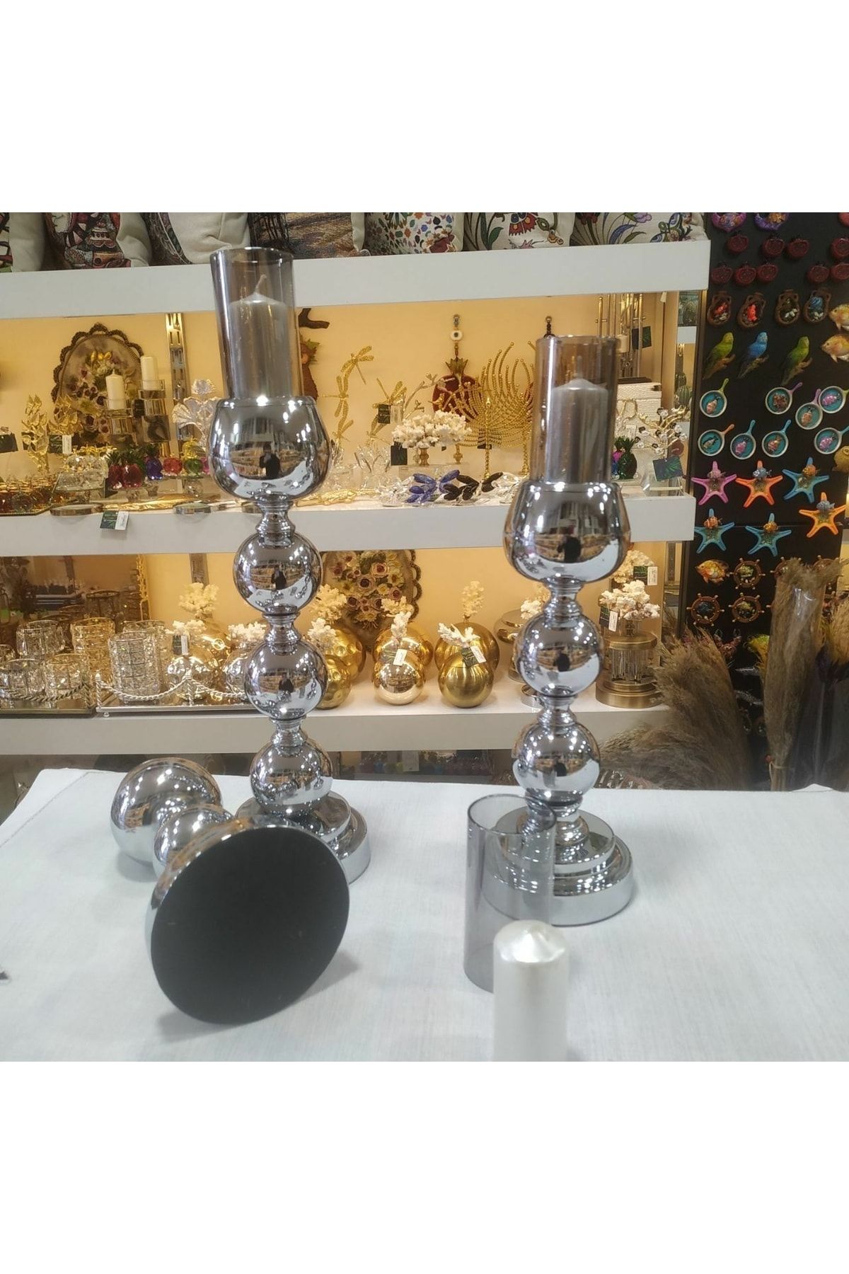 Gold and silver candle store holders