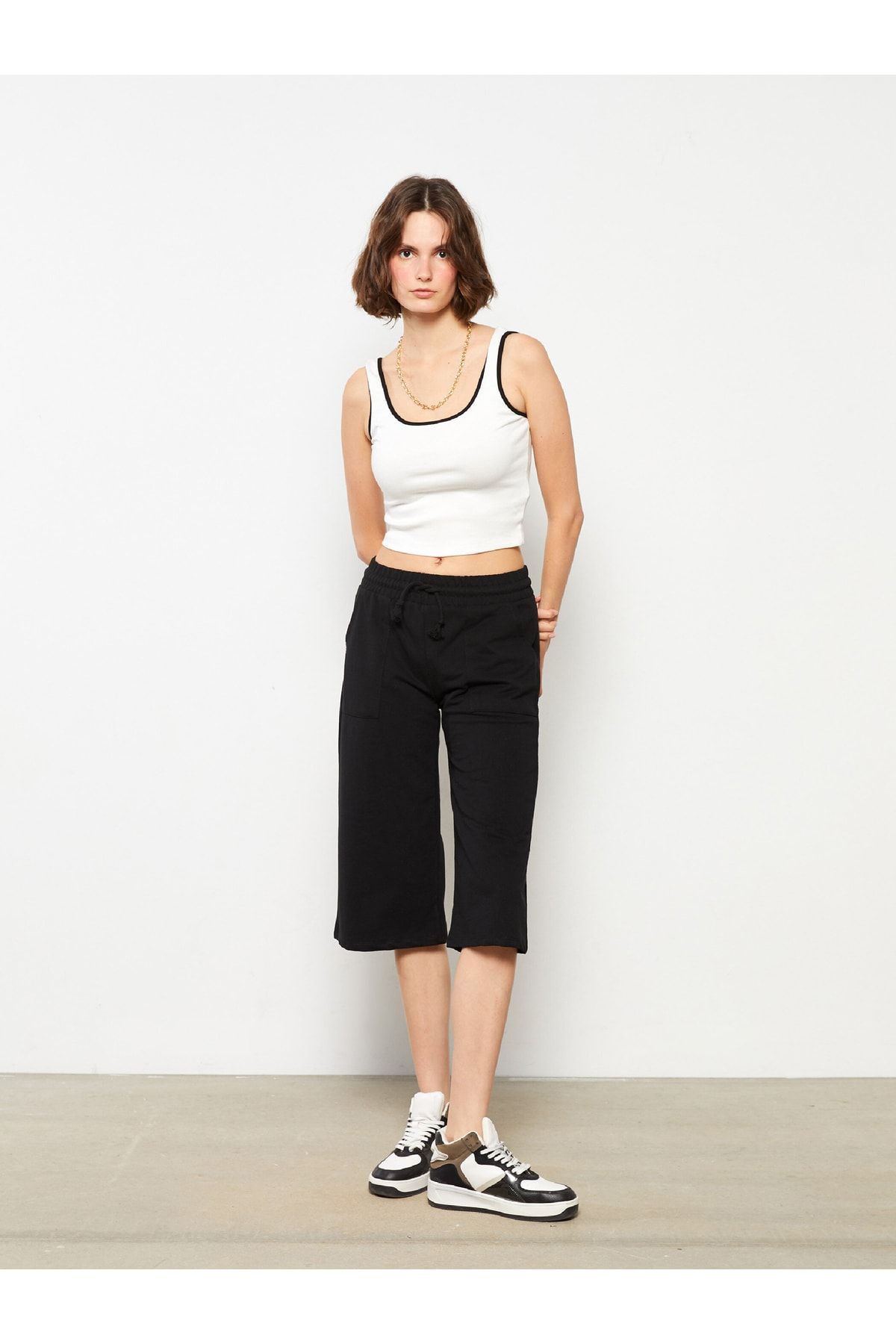 LC Waikiki Damskie Capri Z Elastyczną Talią I Płaską Kieszenią Kobieta - M