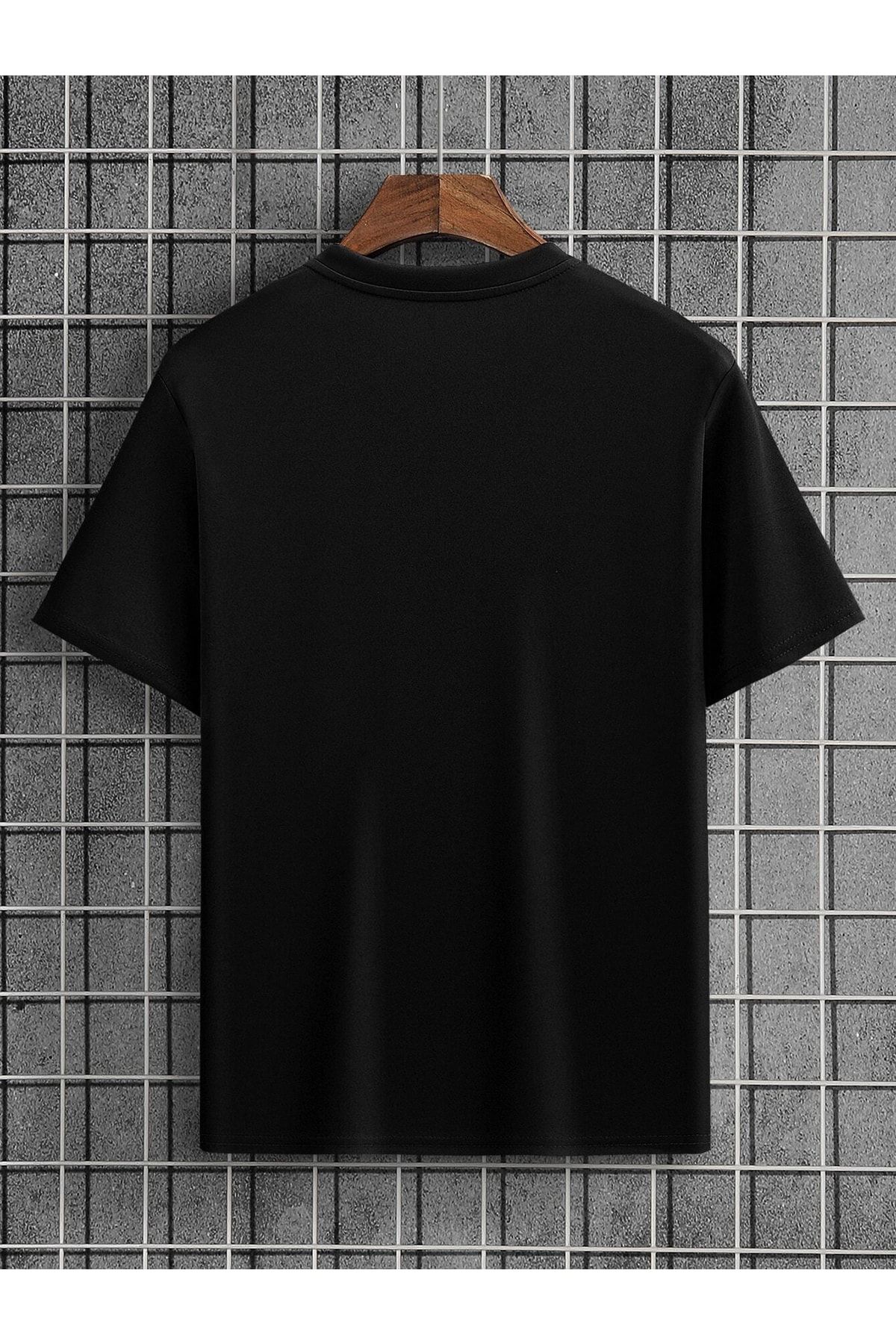 Plain black t shop shirt on hanger