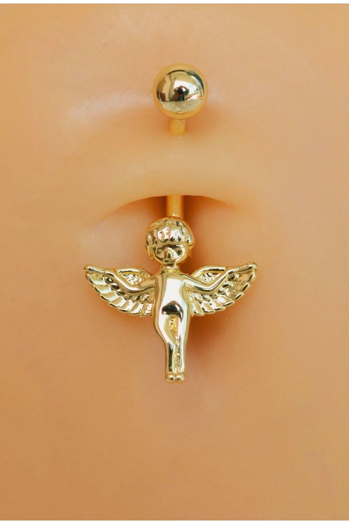 Belly store piercing gold