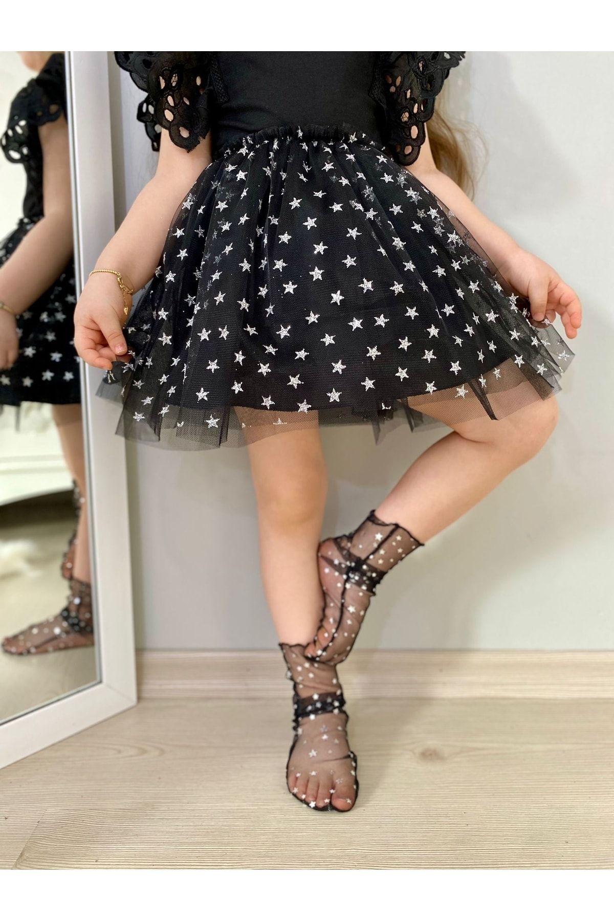 Black tulle skirt with outlet stars