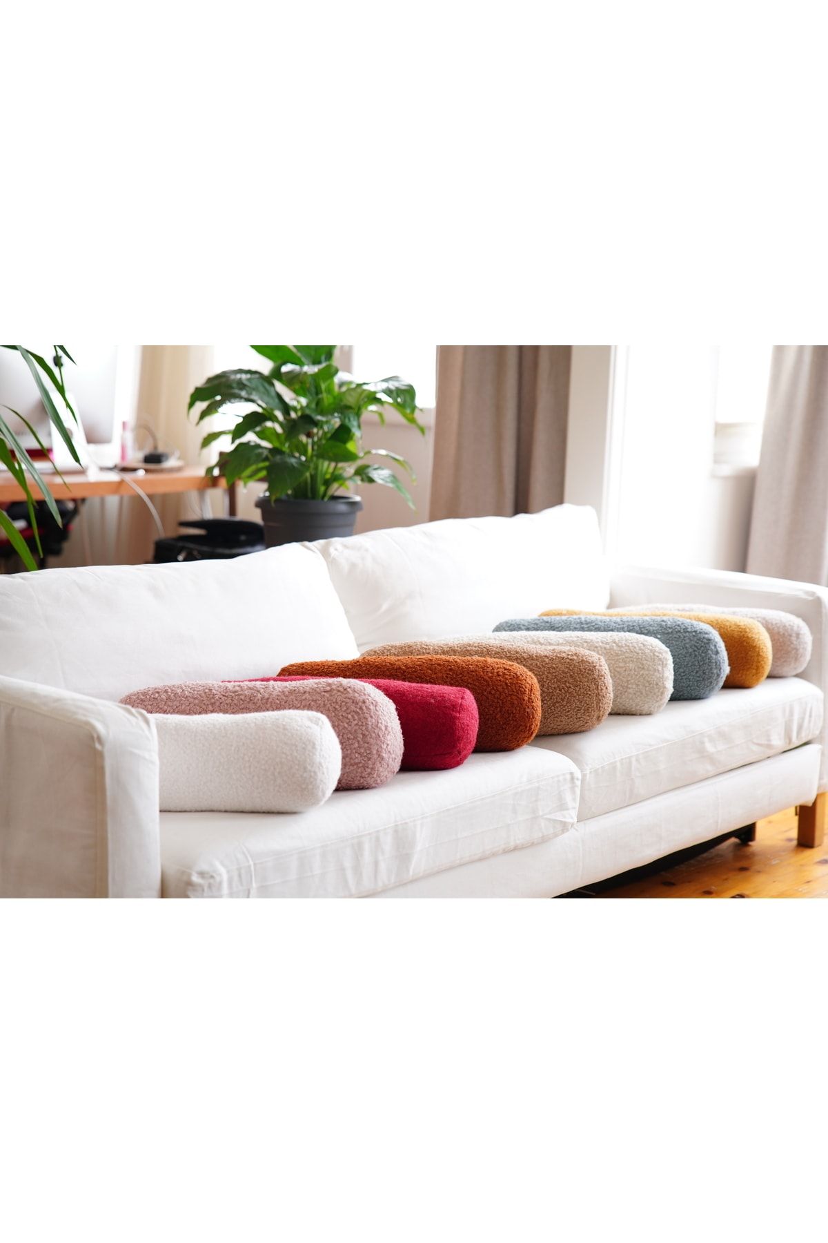 Cylinder outlet couch pillows