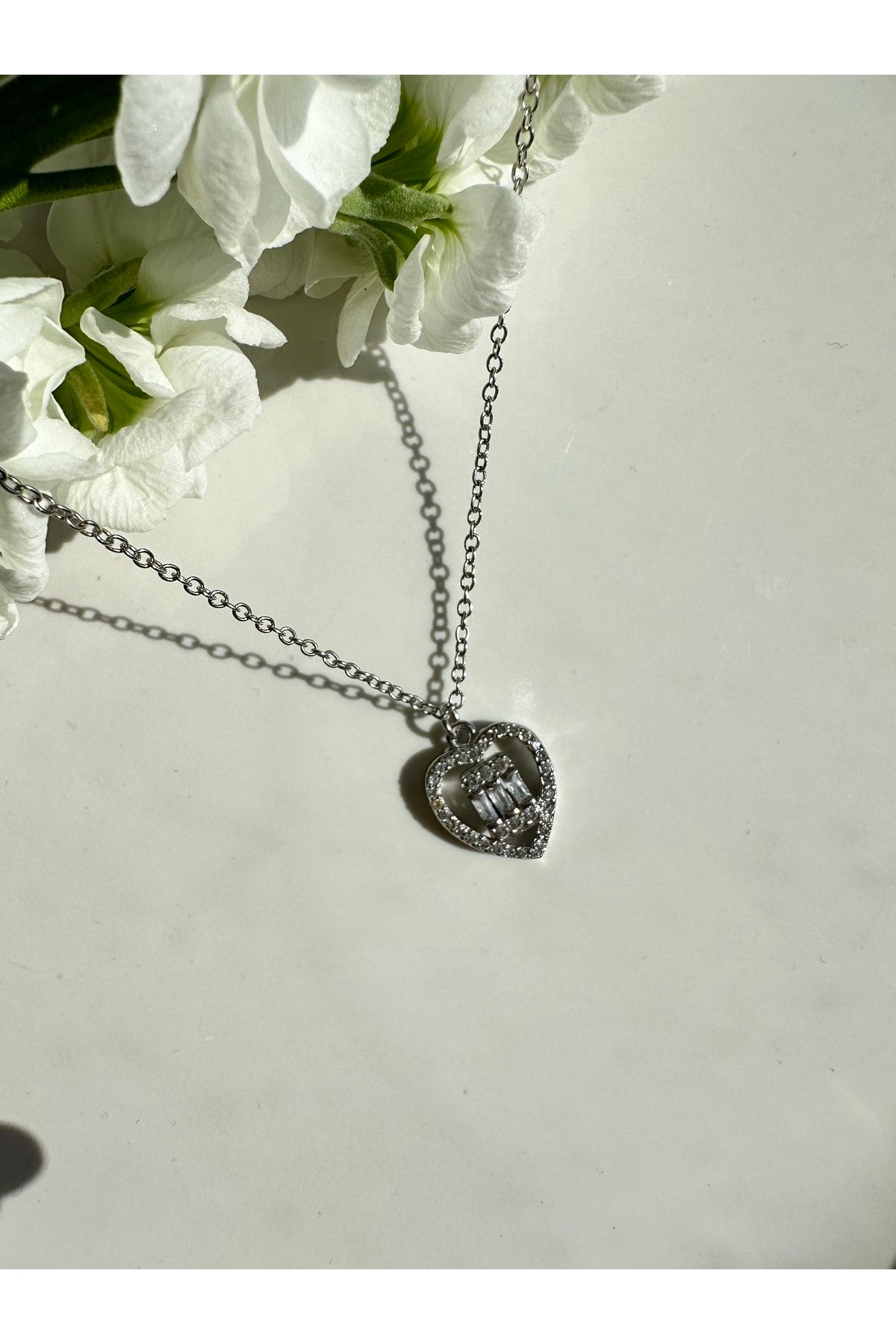 Gucci necklace with hot sale heart pendant