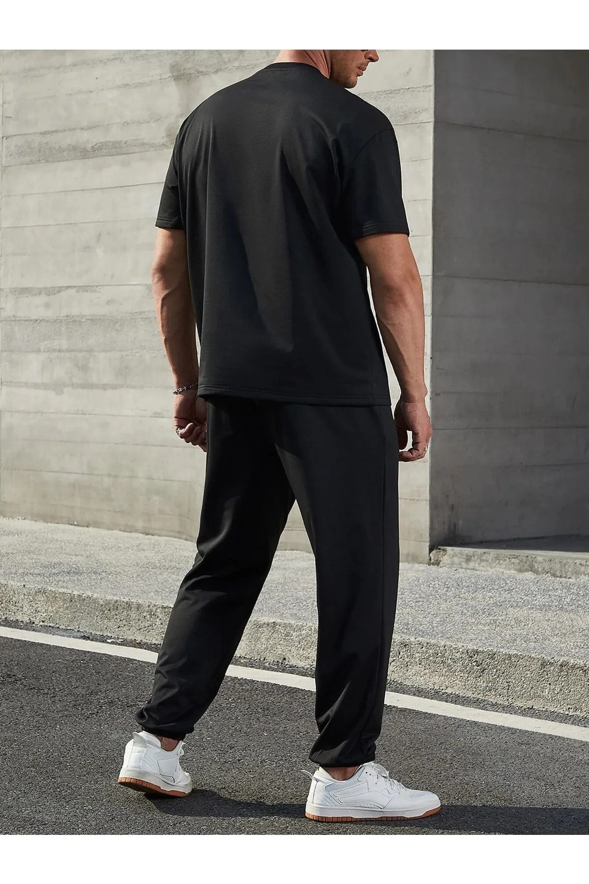 Black track pants outfit men top