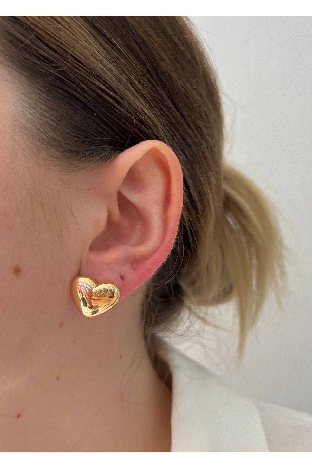 Heart earring 2025 inside ear