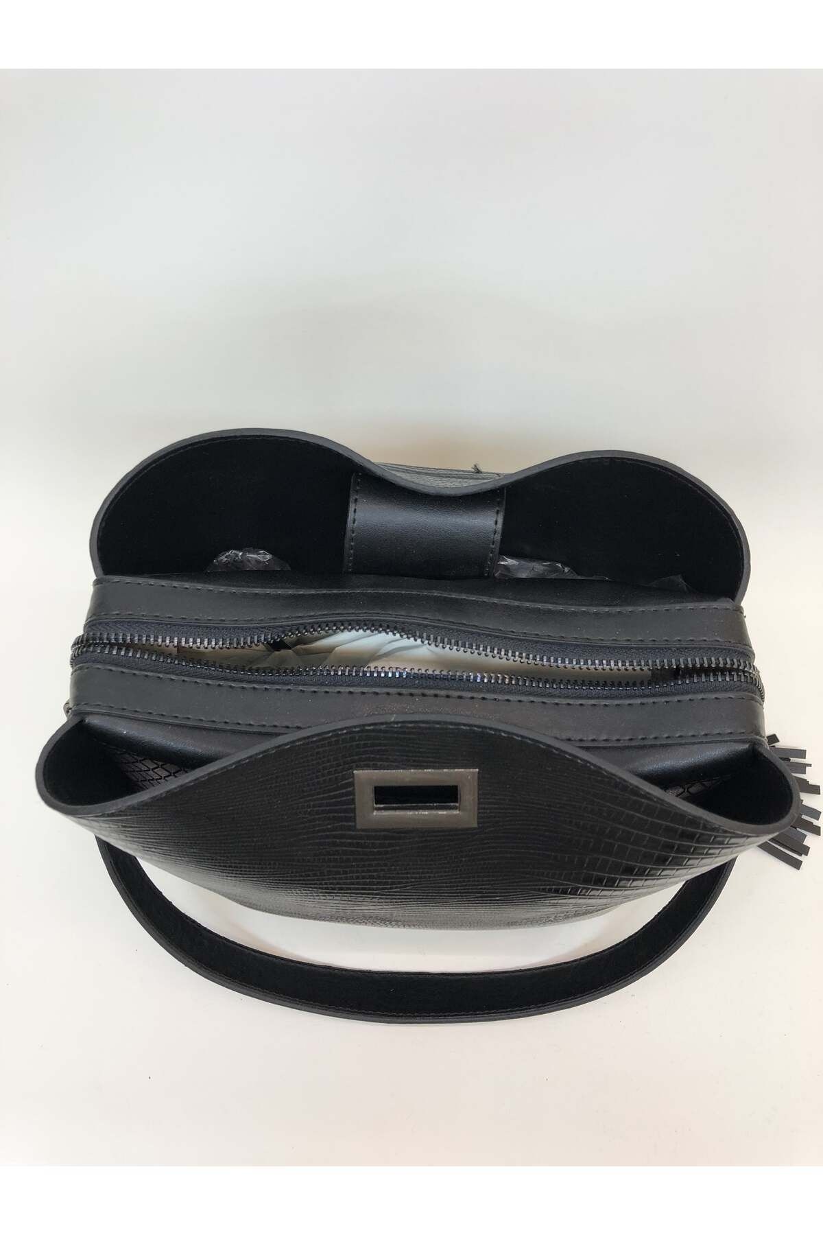 womenacs-Culoarea neagră tăiată cu laser poate fi folosită în mână și cu curea de umăr cu o mulțime de ochi și accesorii cu ciucuri 4