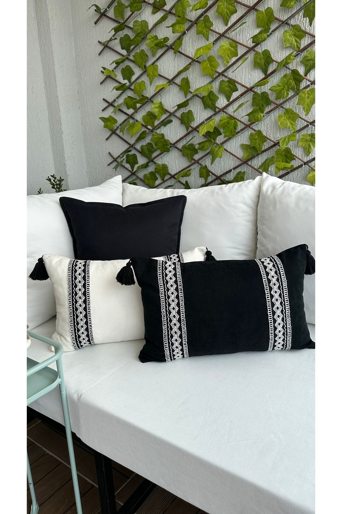 Black and clearance white tassel pillow