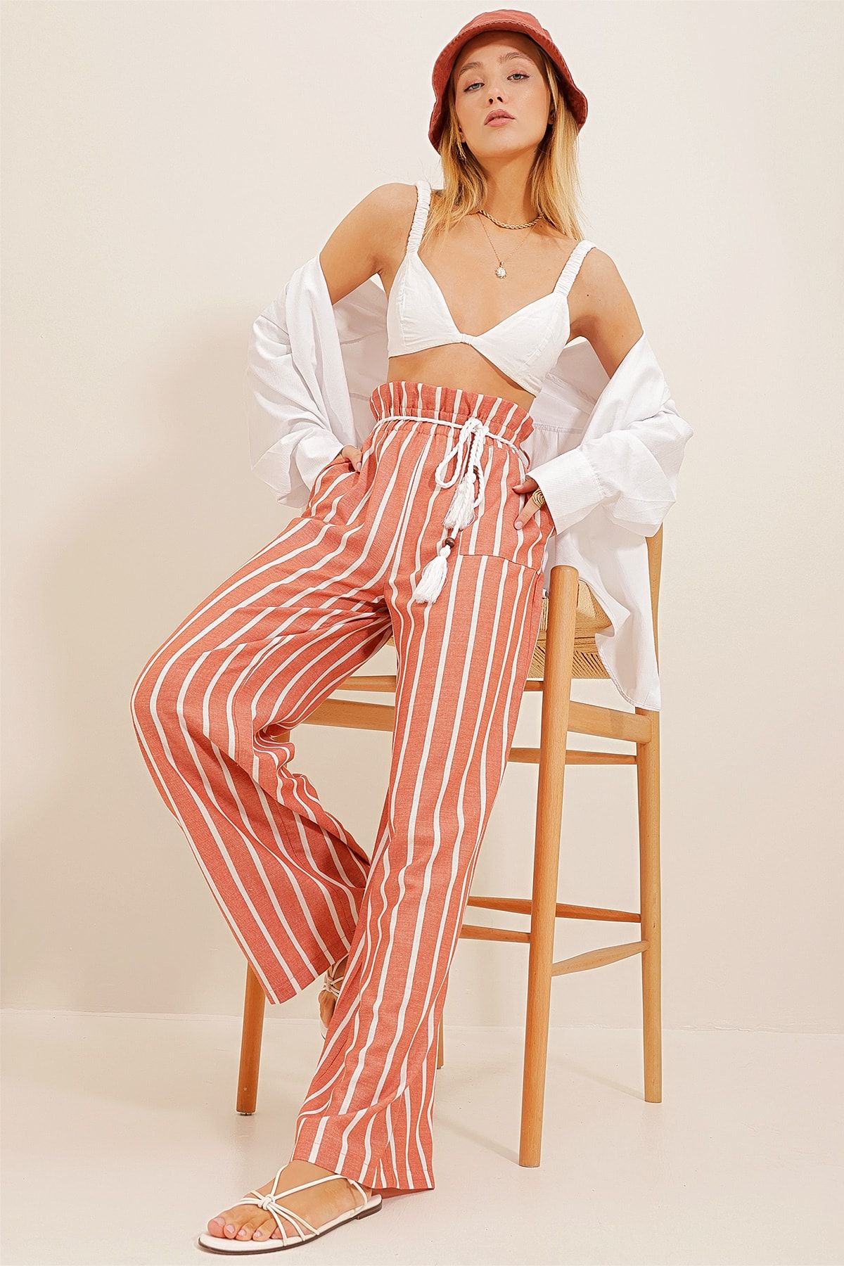 Belted striped pants on sale