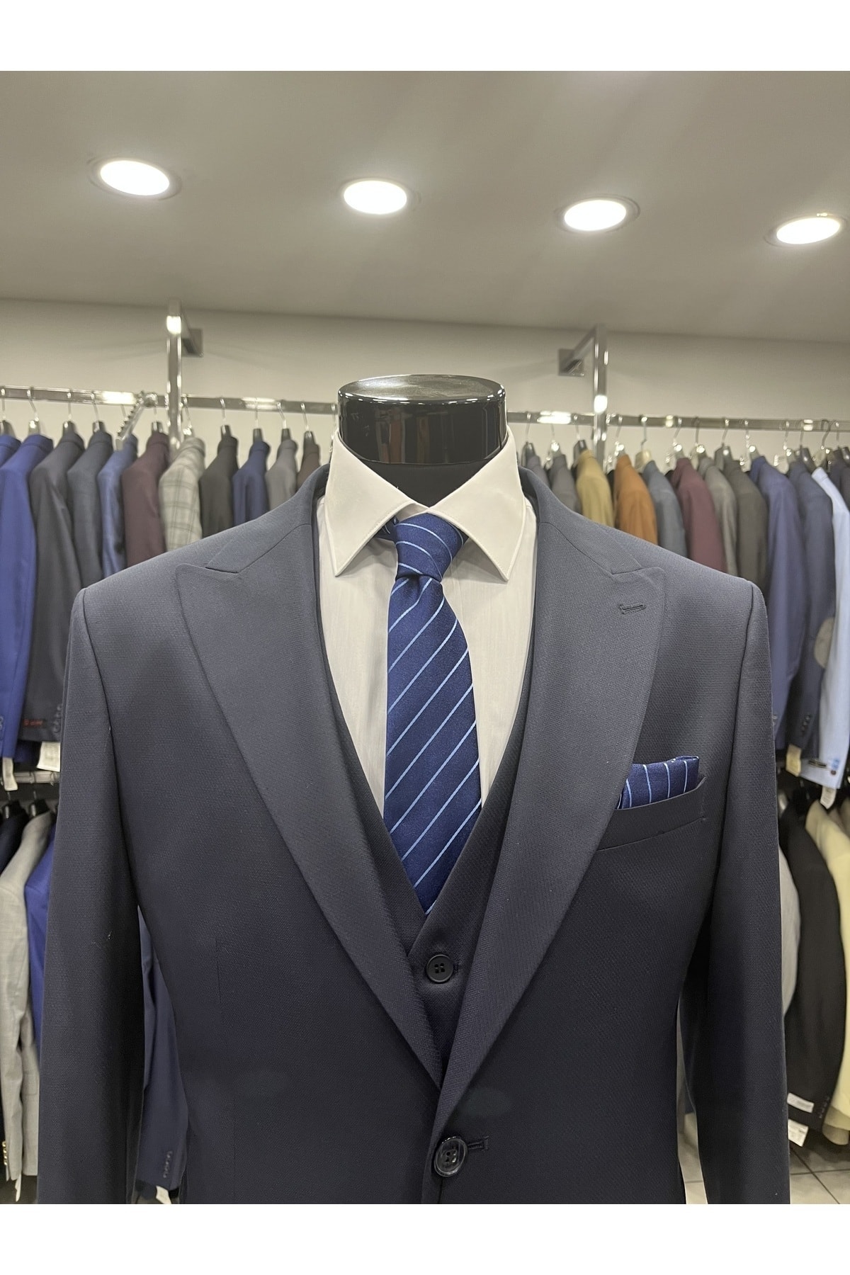 Dark design vested suit