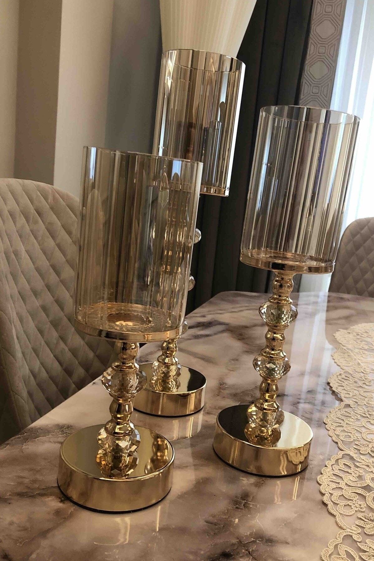 Gold and silver candle store holders