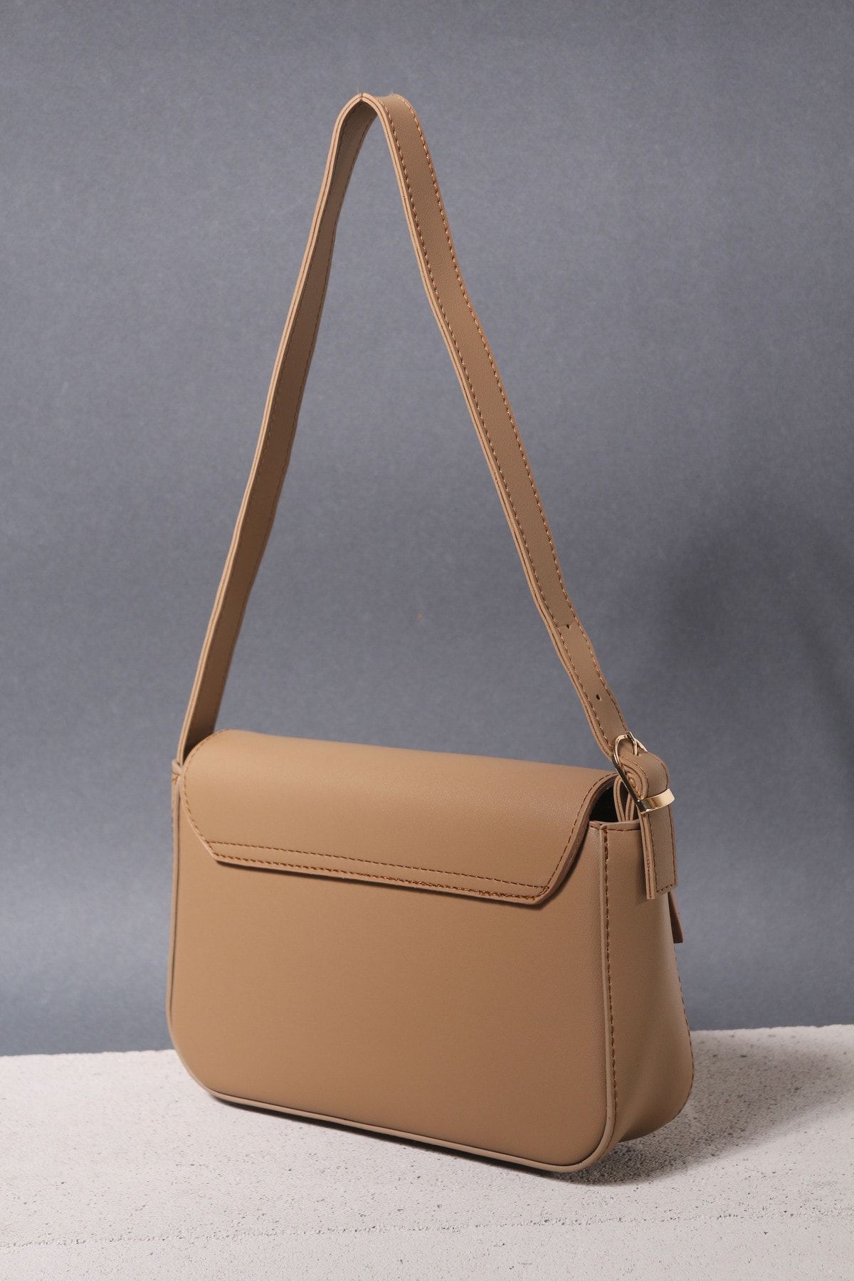 Nude discount baguette bag