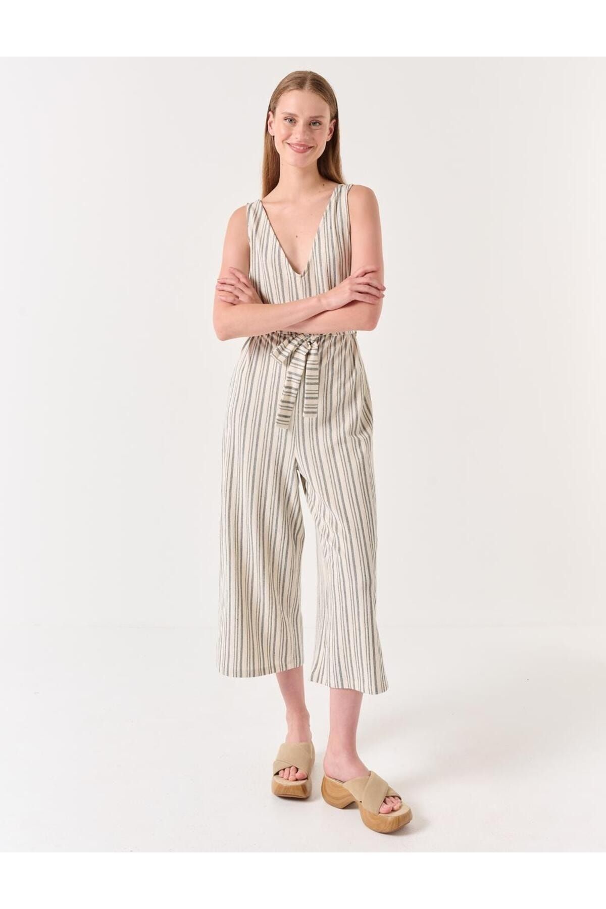 H&m blue and hotsell white striped jumpsuit