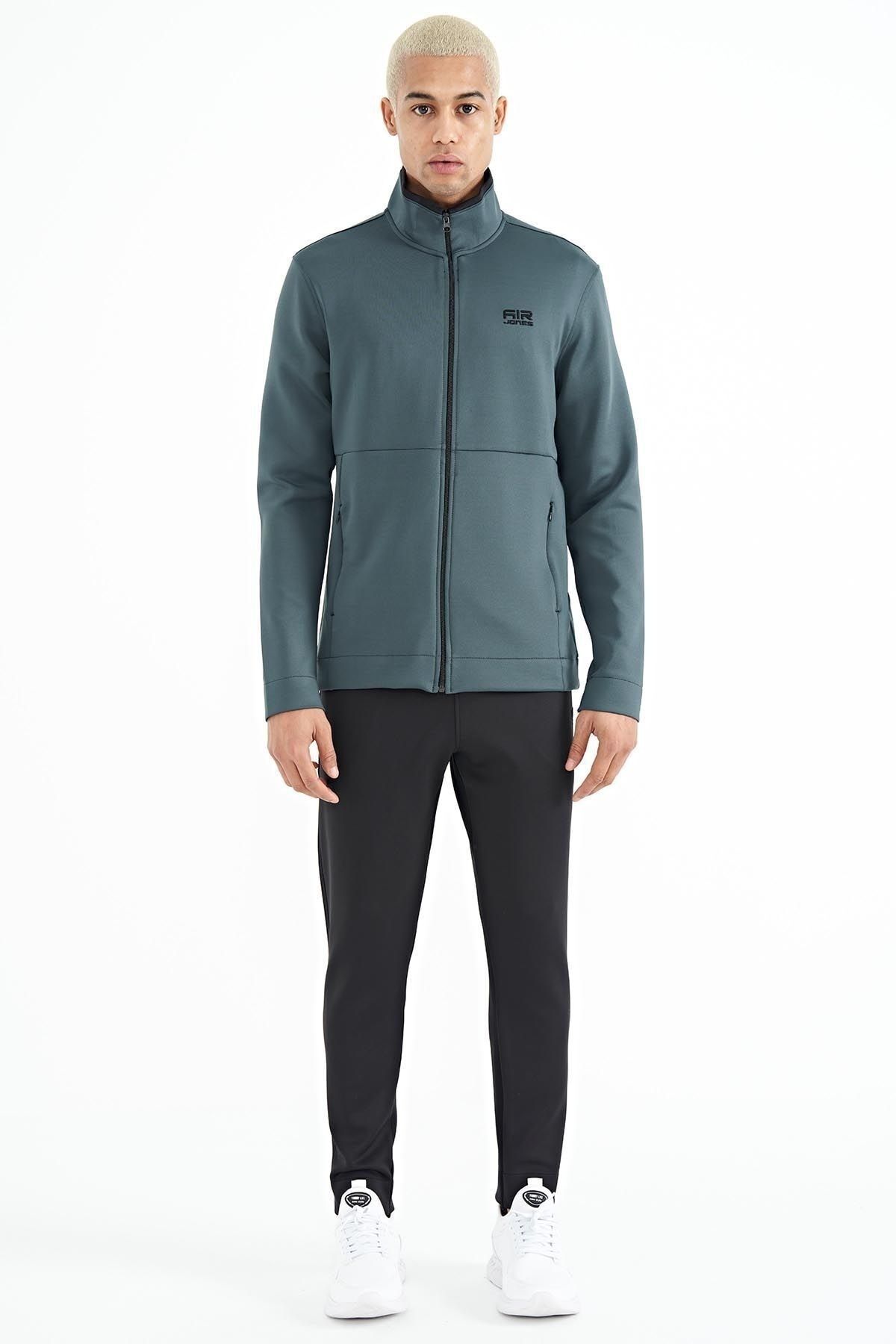Green north face tracksuit mens top