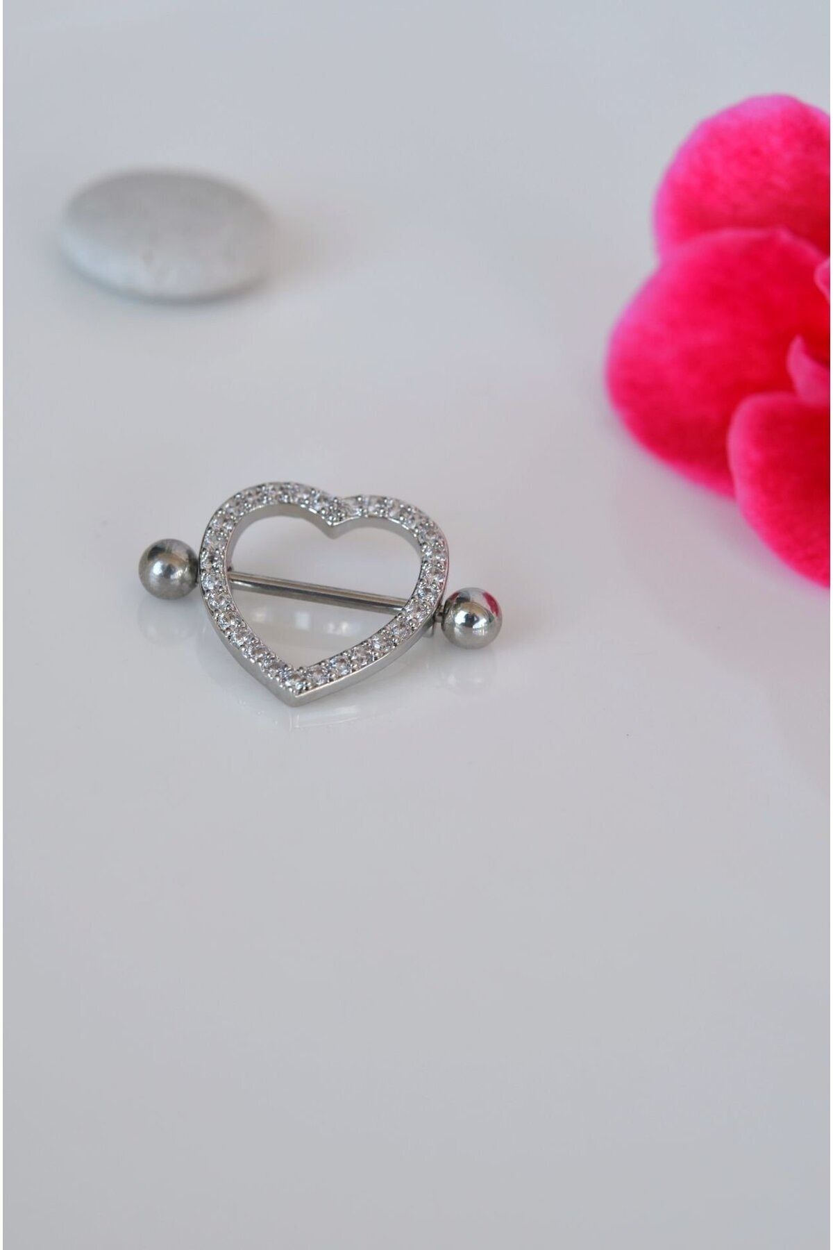Love heart nipple piercing hotsell