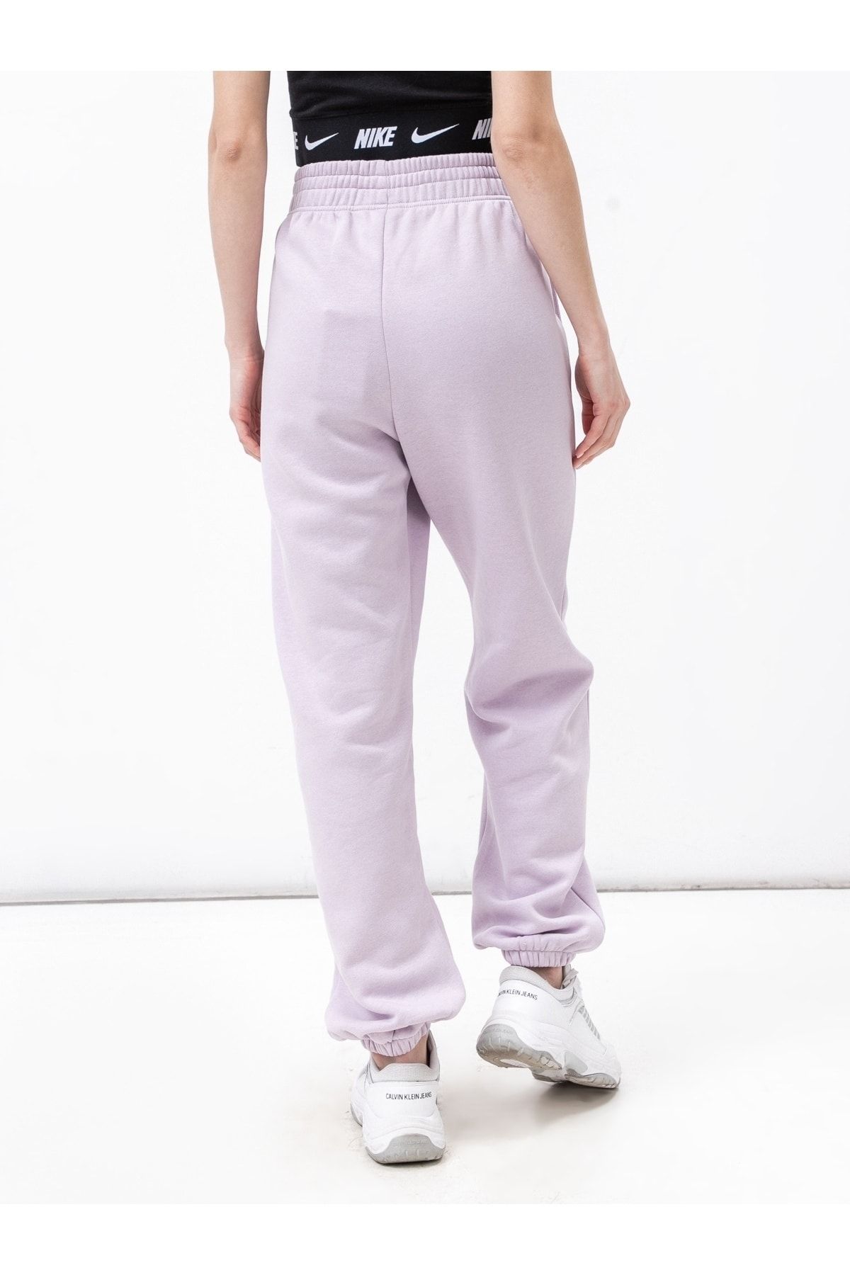 Nike mini swoosh sales oversized joggers in purple