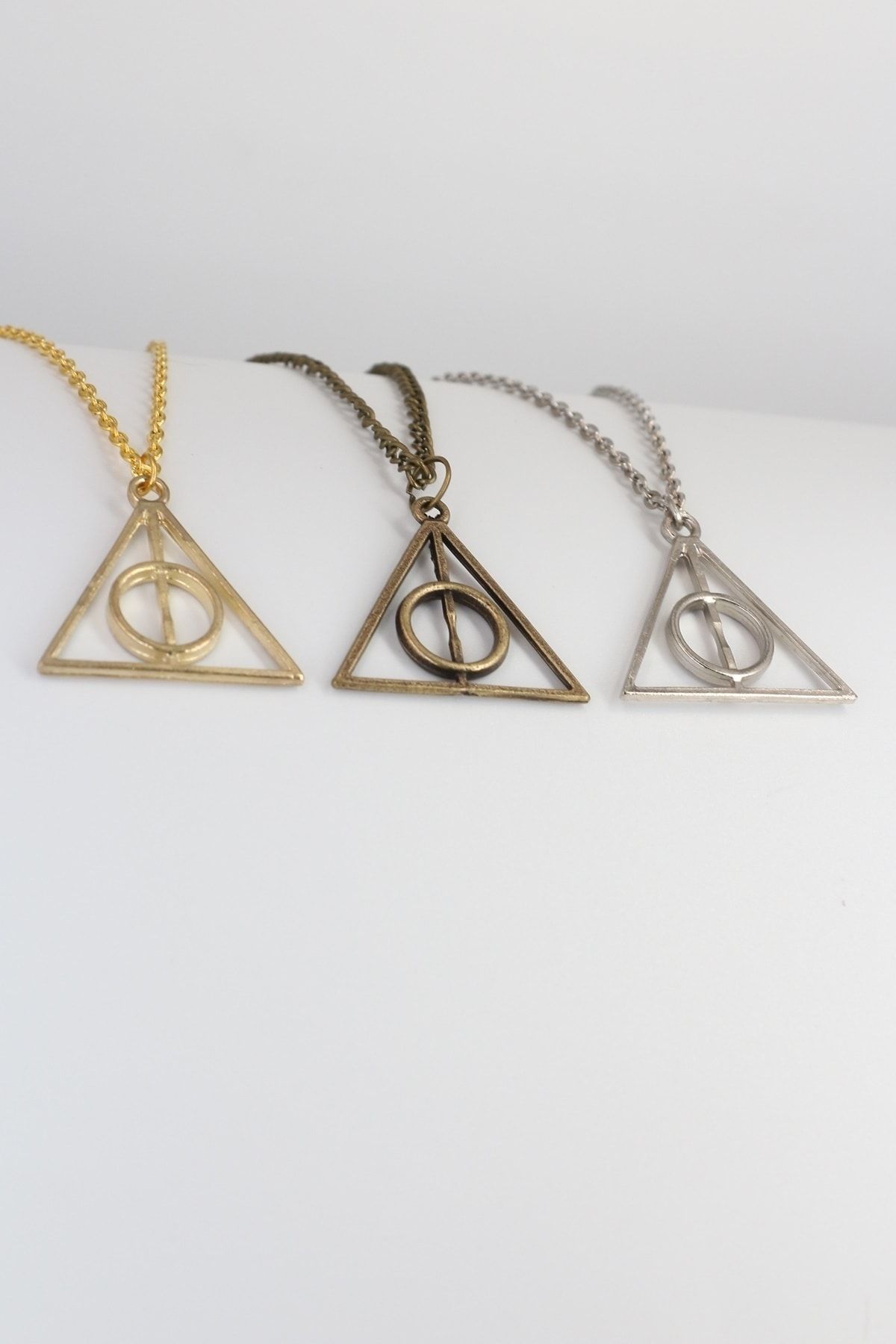 Deathly hallows pendant hot sale