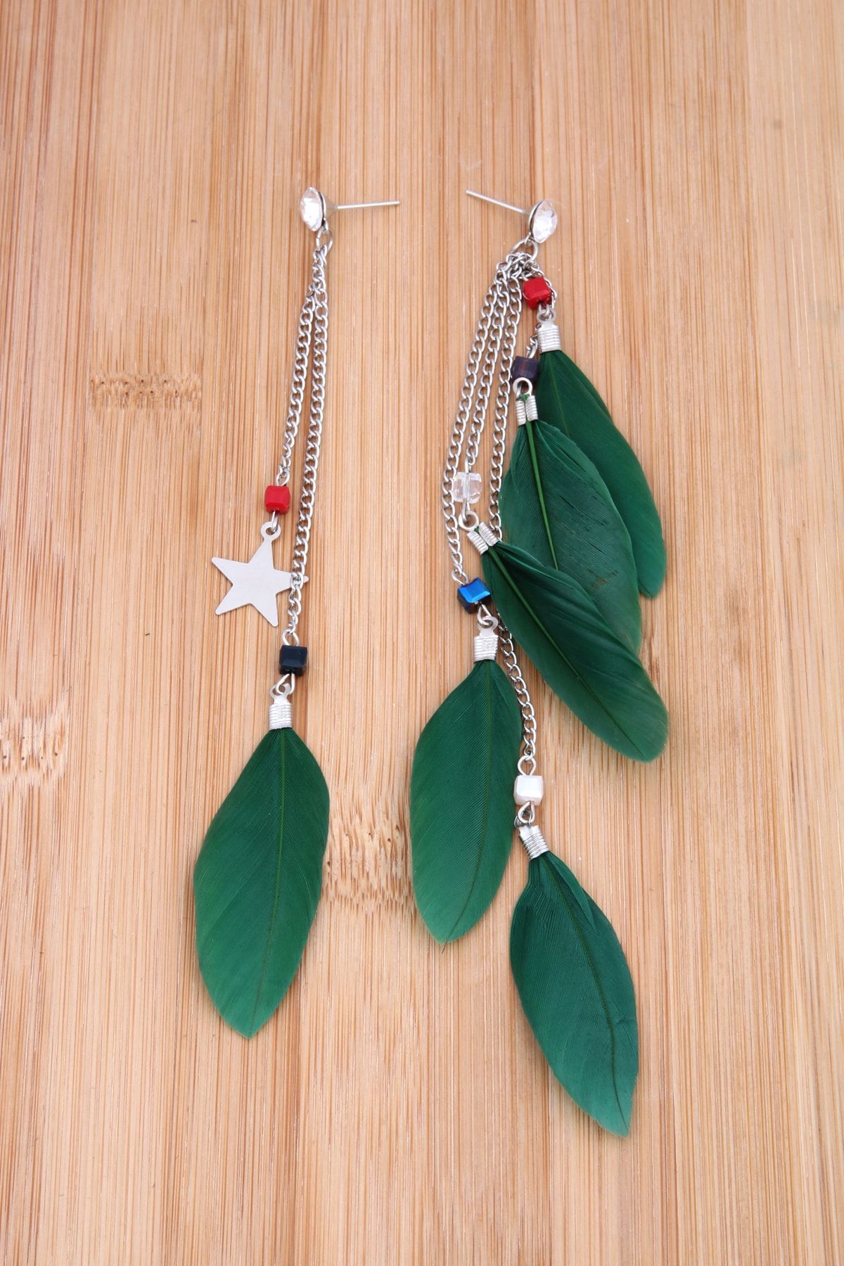Green hotsell feather earrings