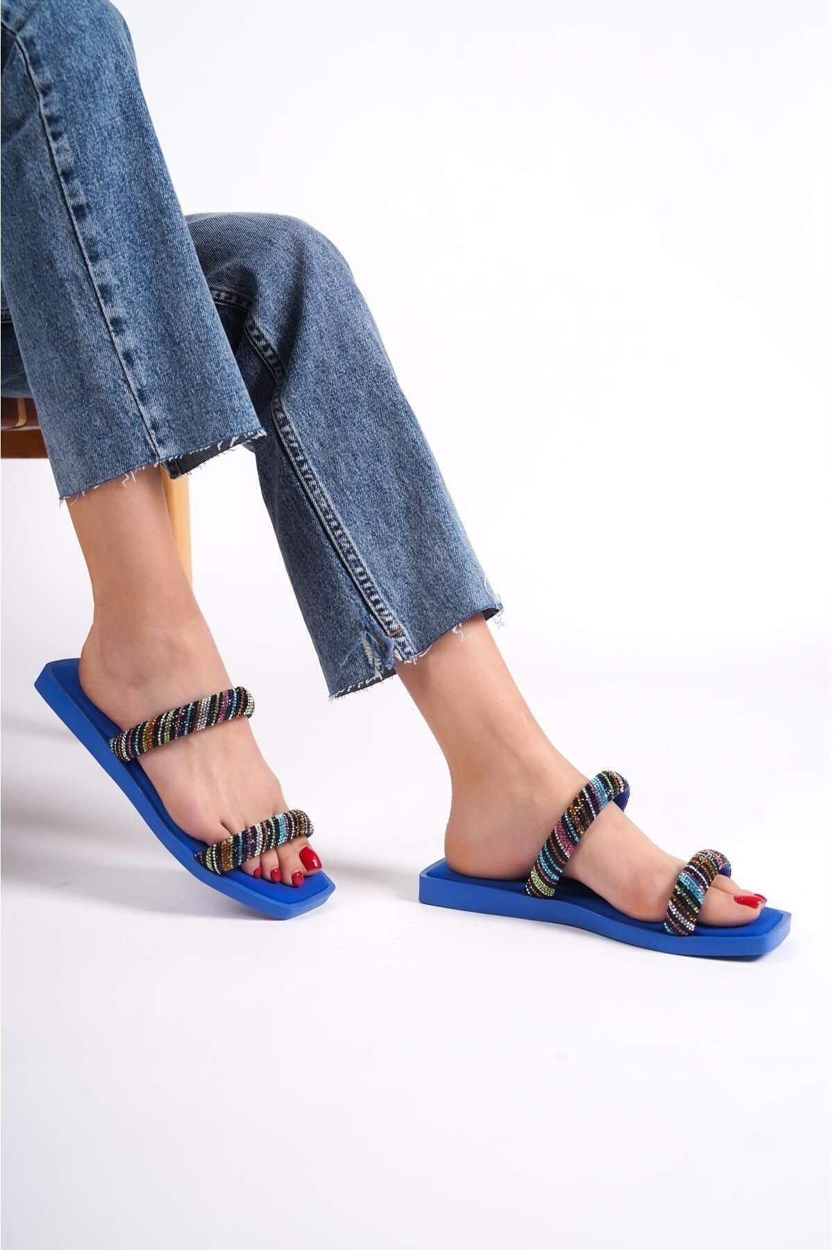 Strapped slippers sales
