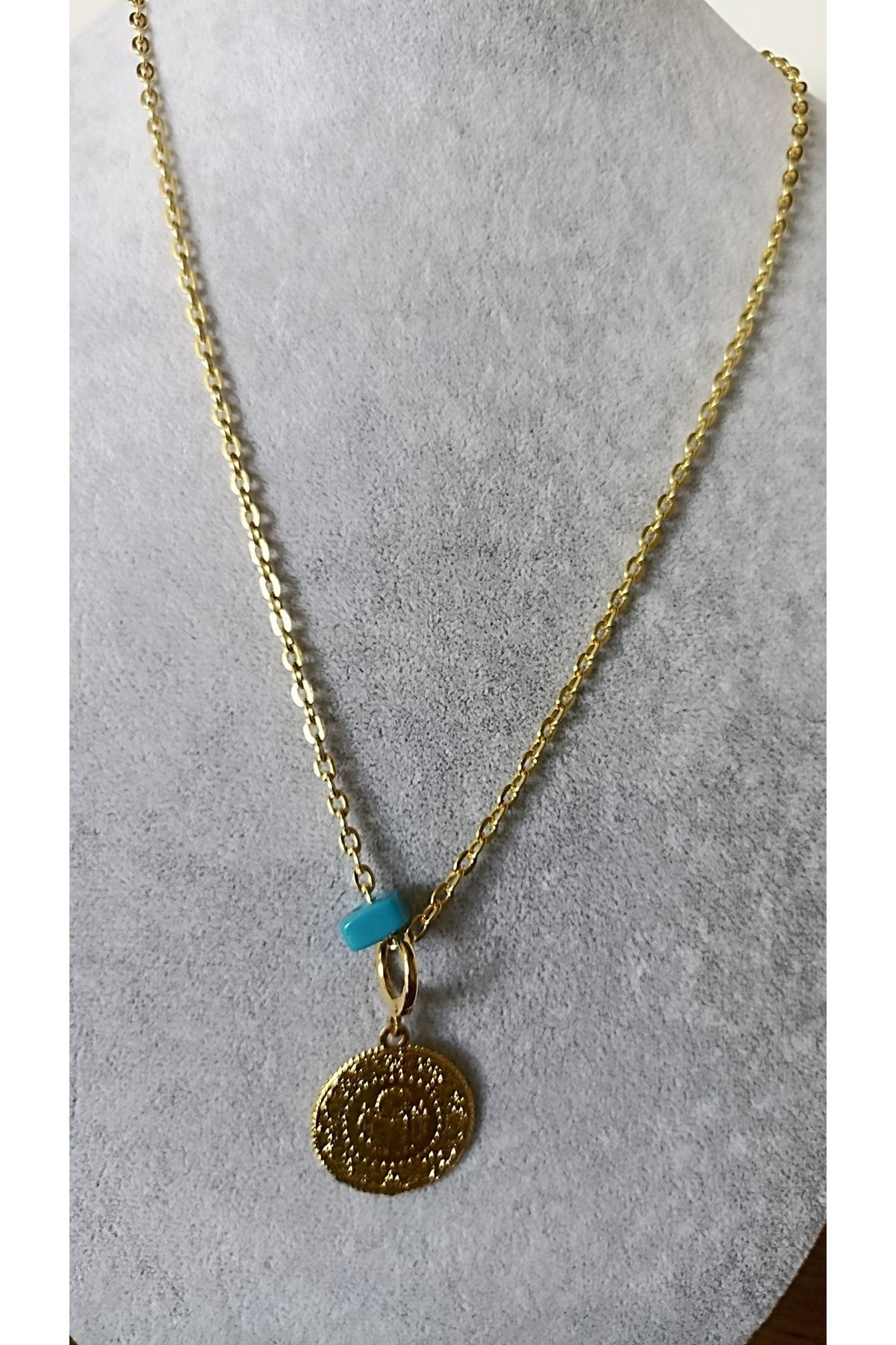 Gold coin store necklace trend