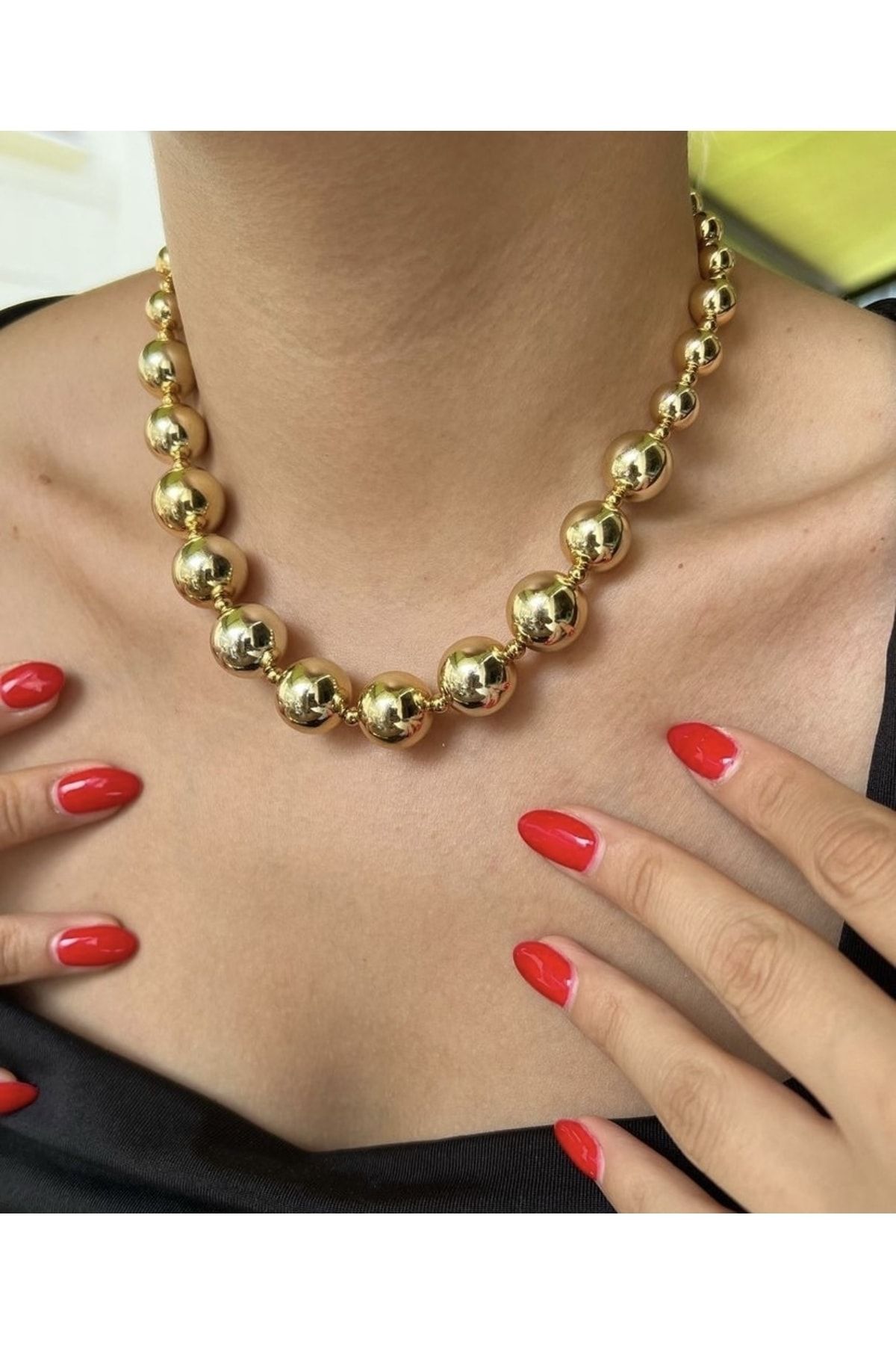 Metal store ball necklace