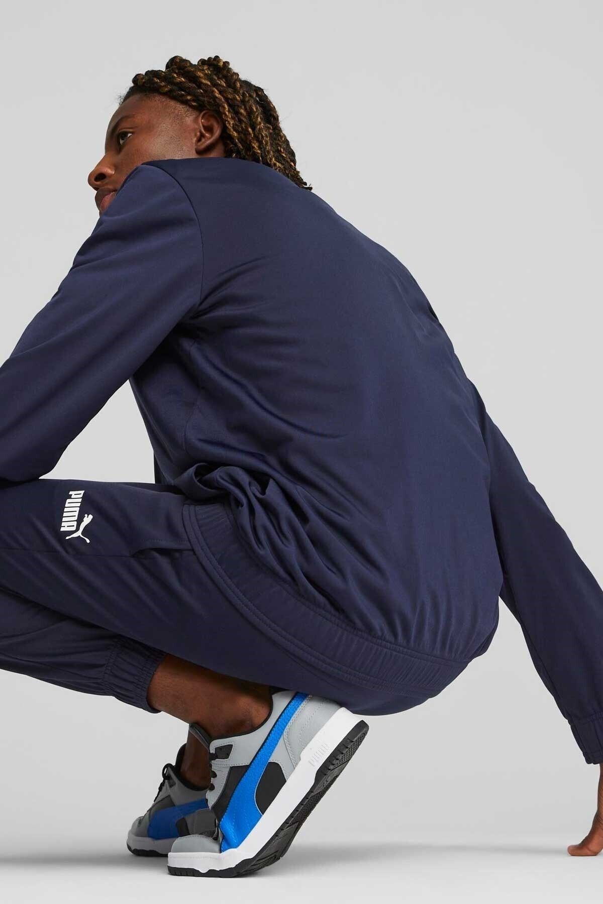 Dark blue puma hotsell tracksuit