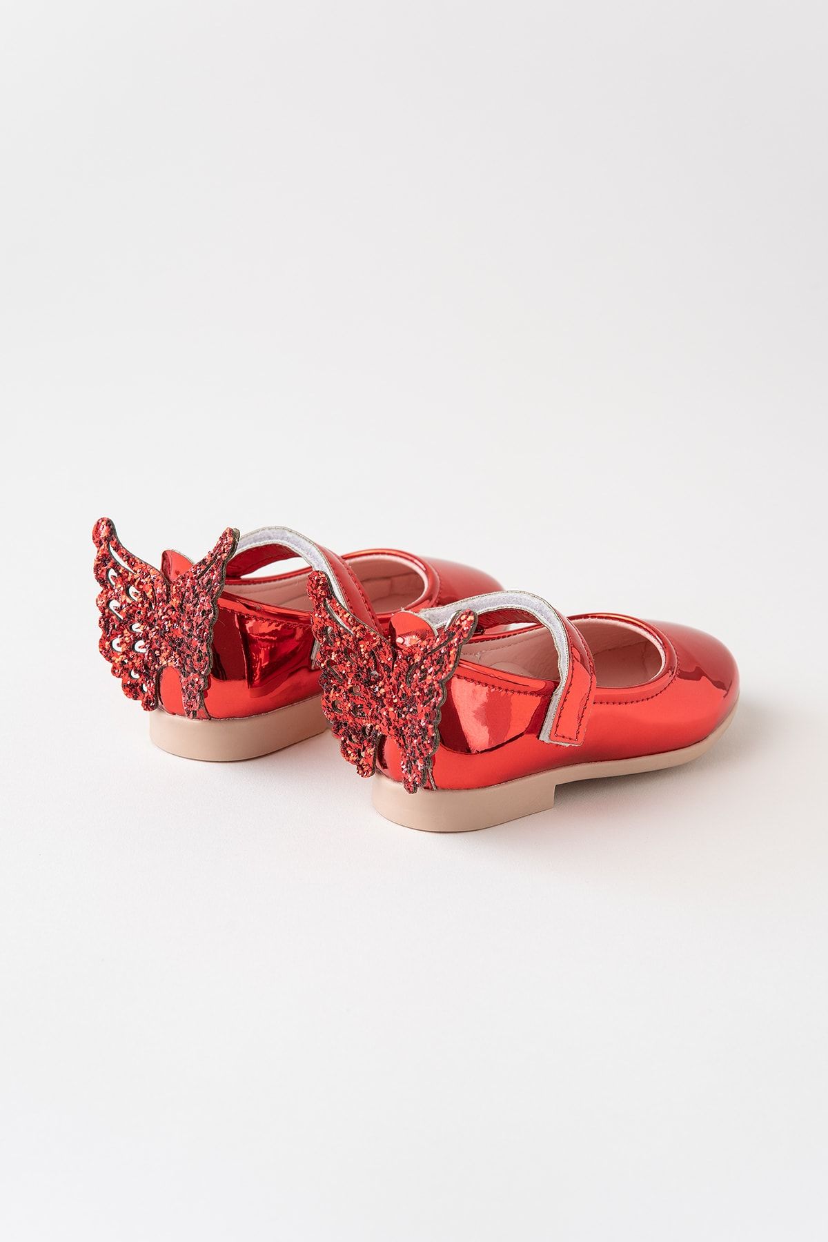 Shoes with butterfly on sale on the back