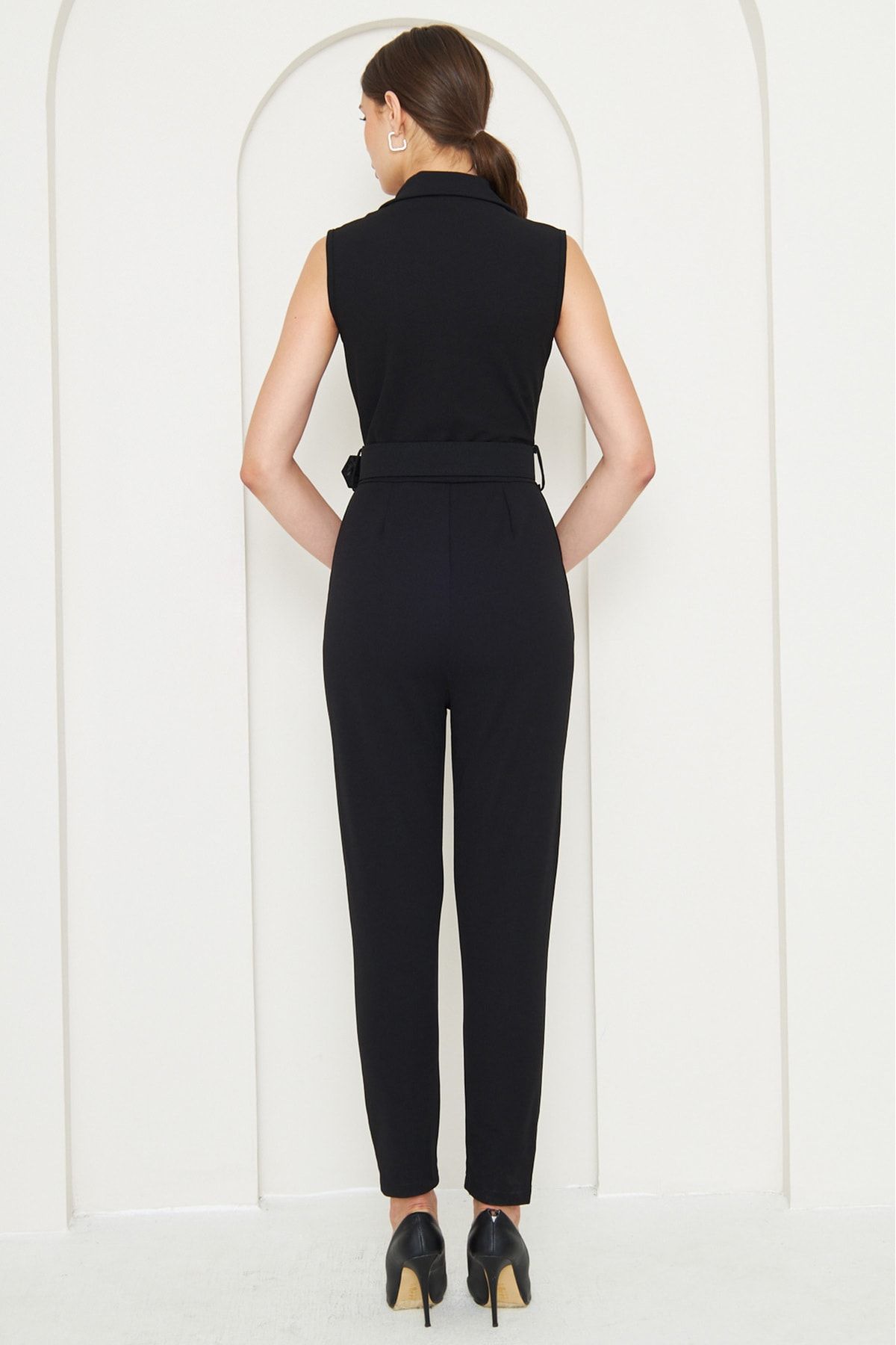 Sleeveless jumpsuit shop with jacket
