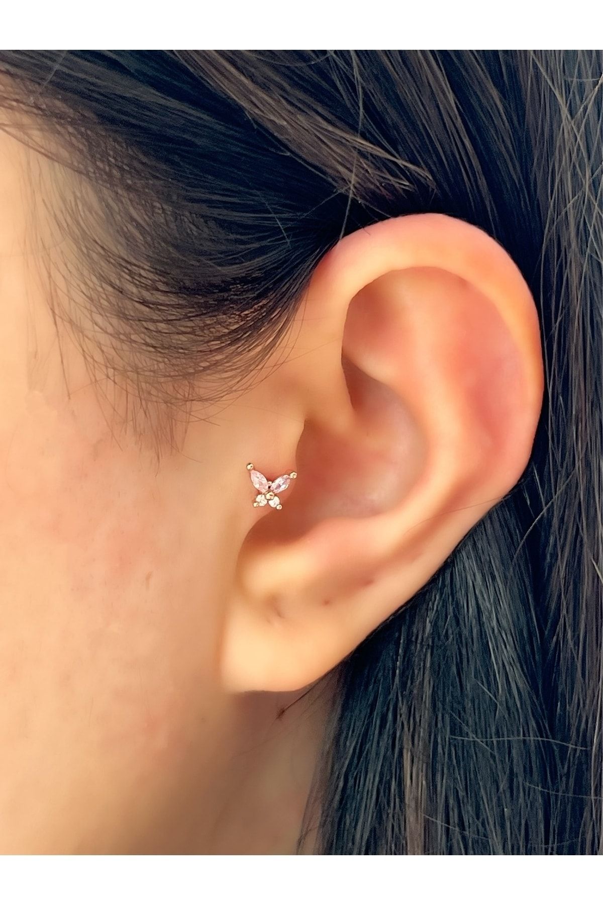 Butterfly tragus outlet piercing