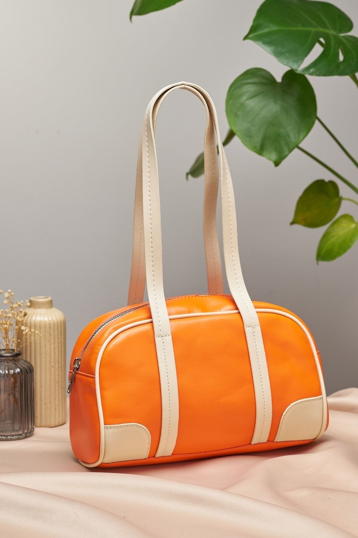 Orange online handbag trend