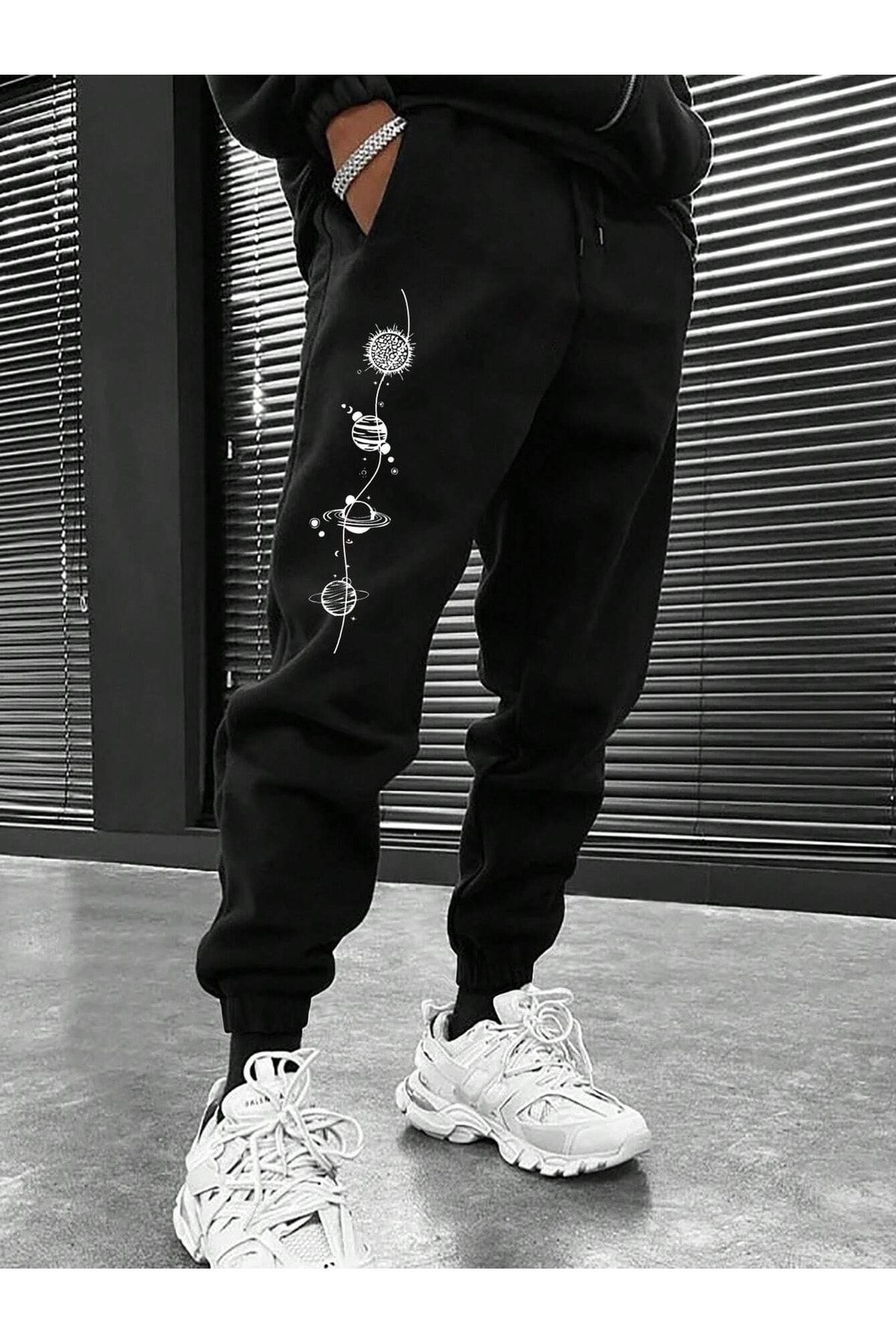One leg black best sale one leg white sweatpants