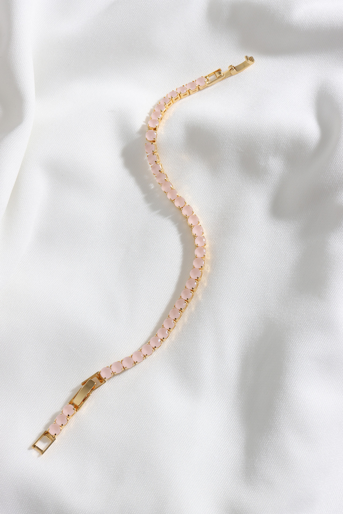 POWDER PINK TRANSPARENT STONE WATERWAY GOLD BRACELET