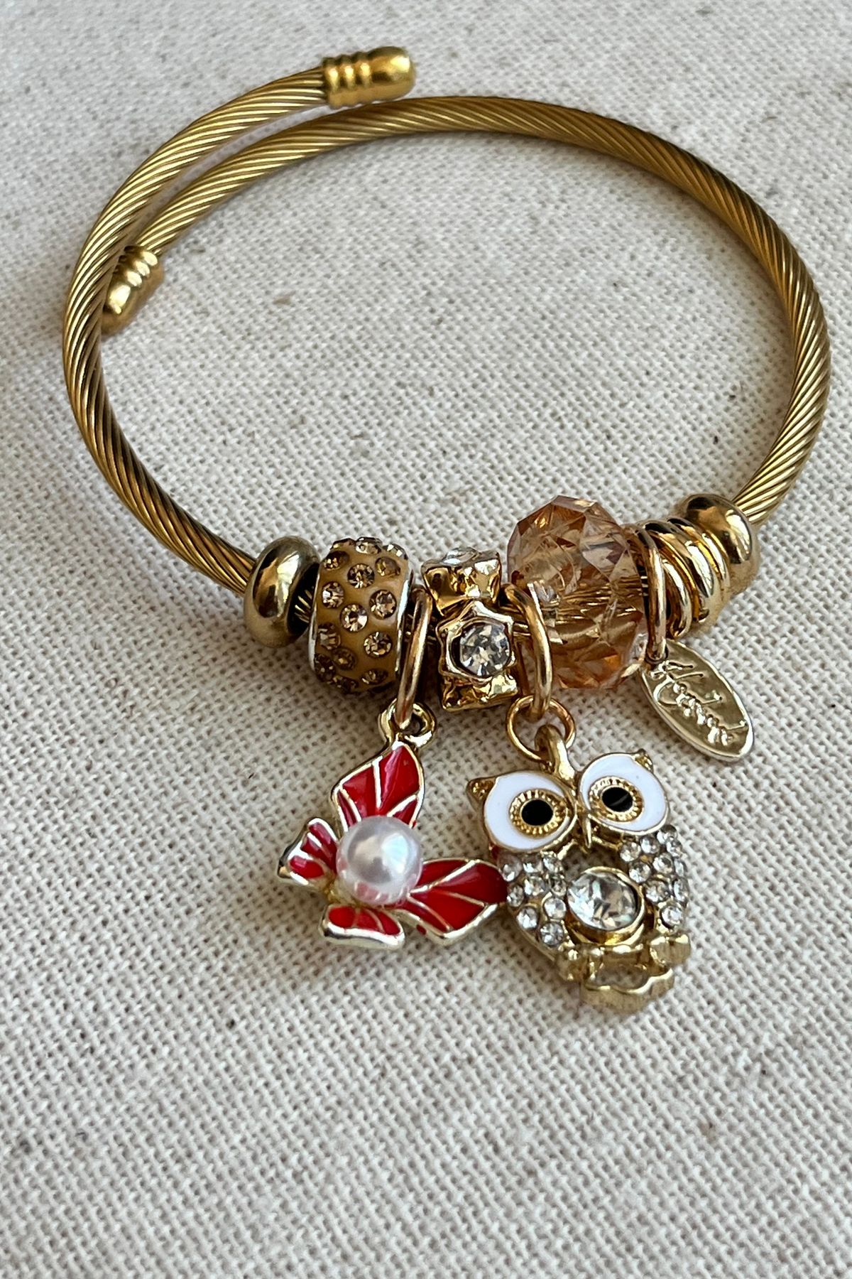 Gold charms store for women