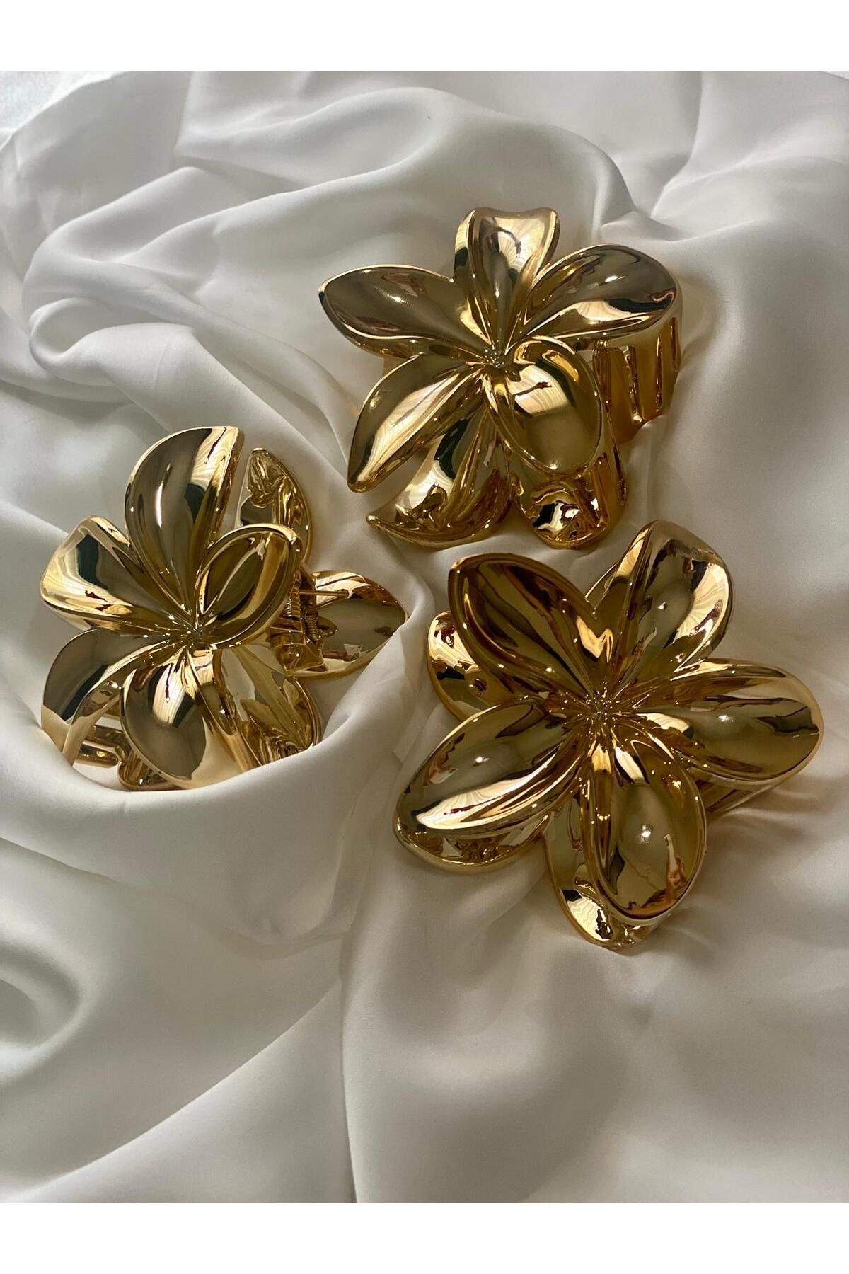 Gold flower on sale clip