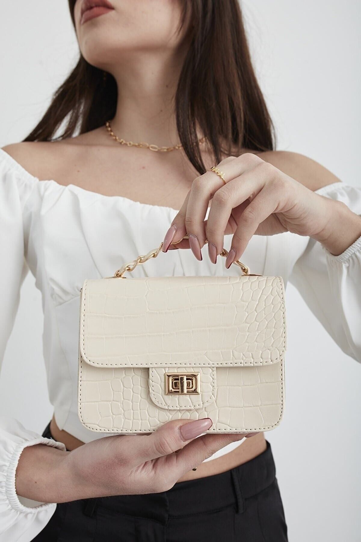 Cream best sale croc bag