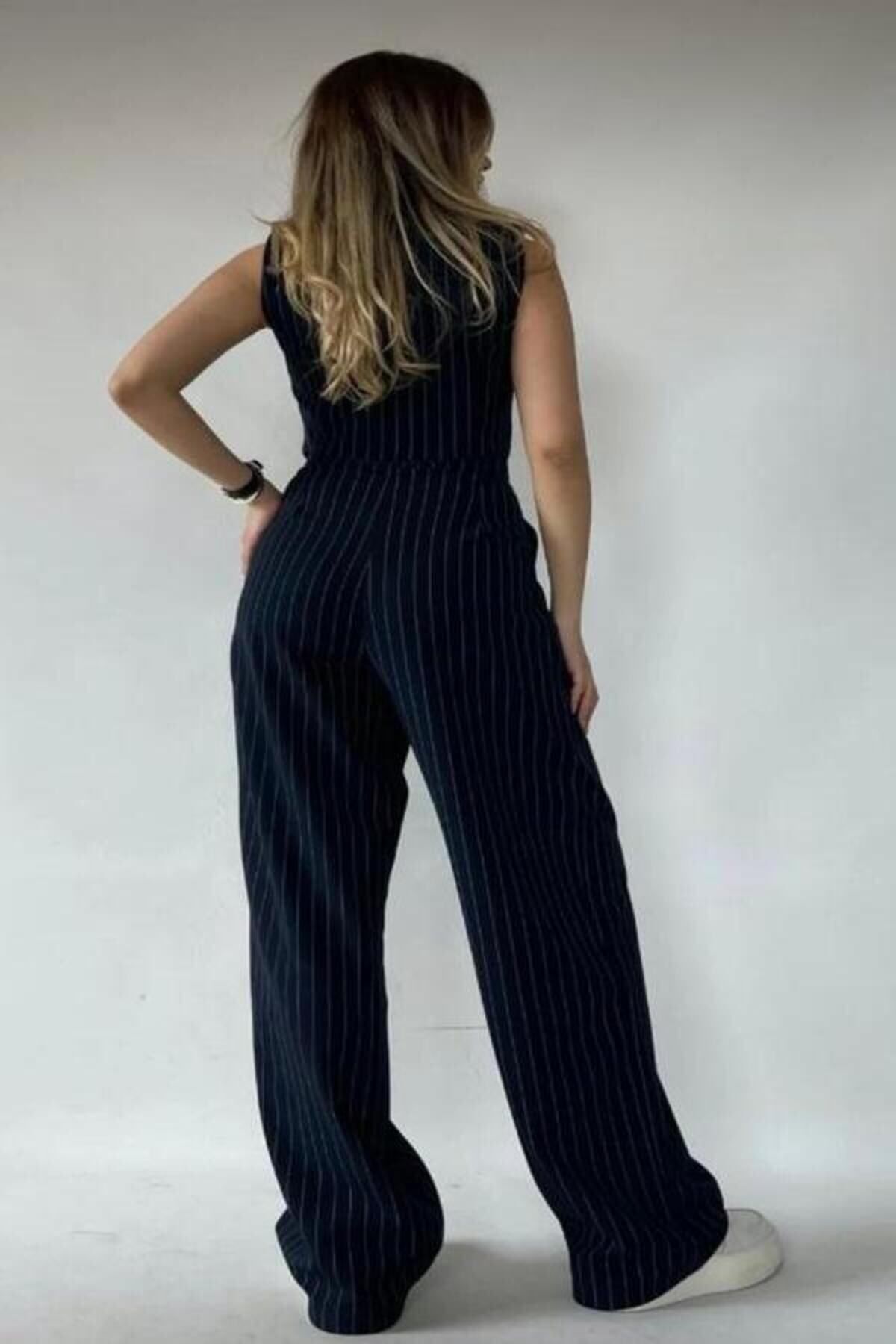 MODAL N women s black striped palazzo trousers Trendyol