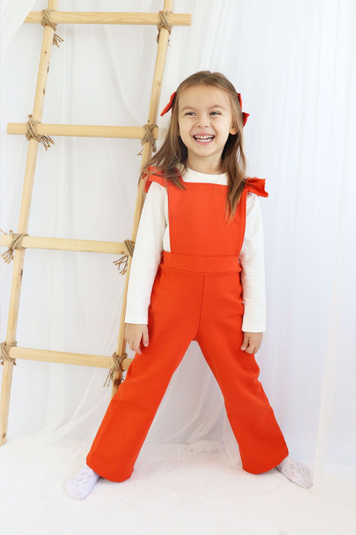 Girl in best sale orange jumpsuit