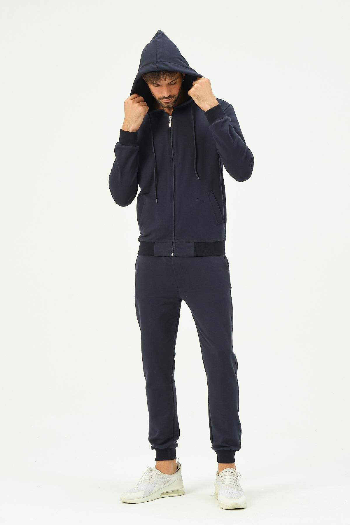Man official tracksuit hotsell