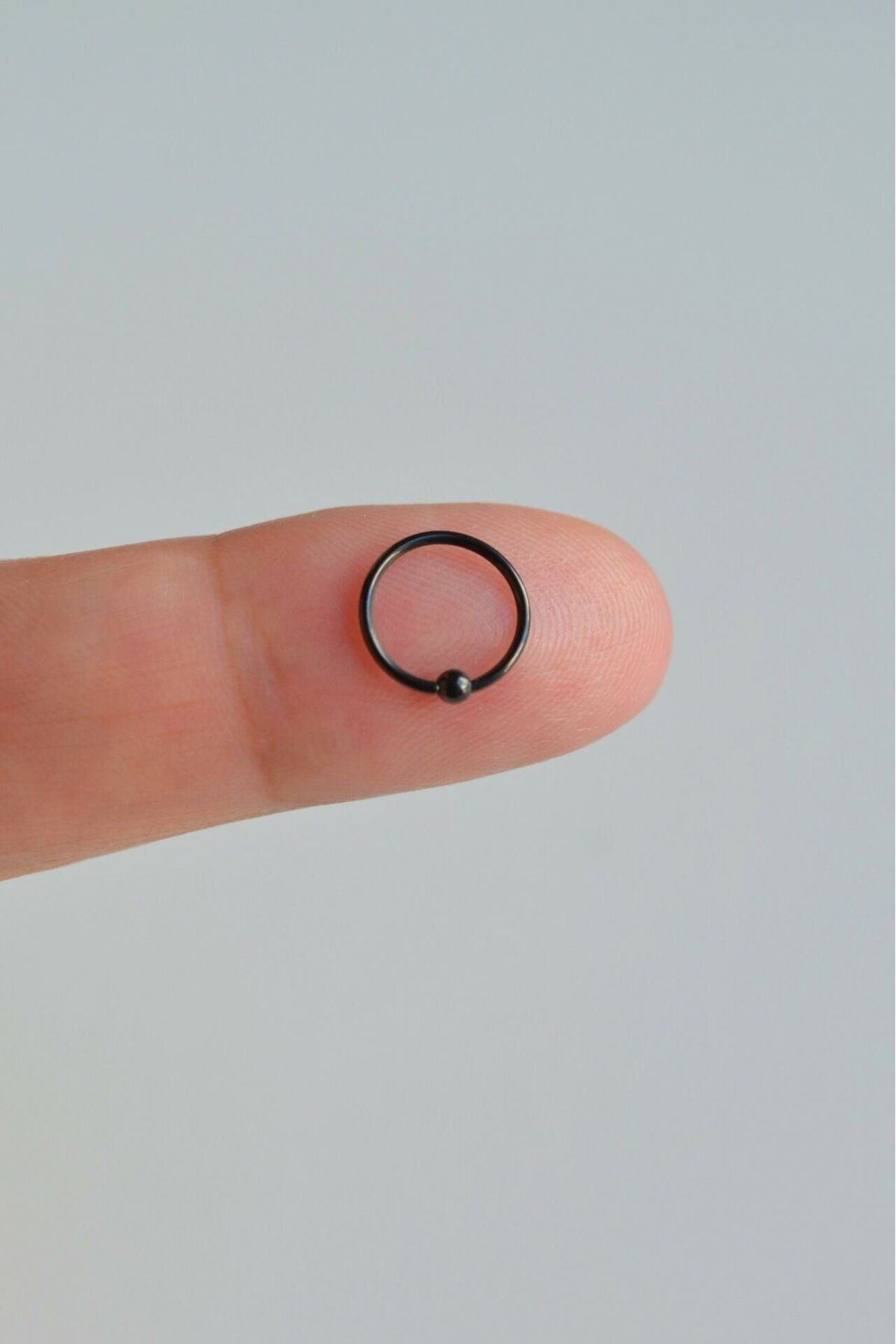 Small black nose hot sale ring