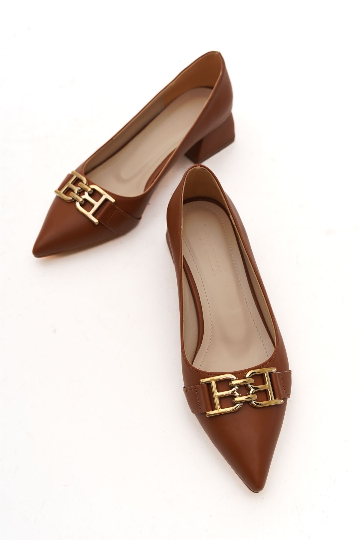 Tan top buckle shoes